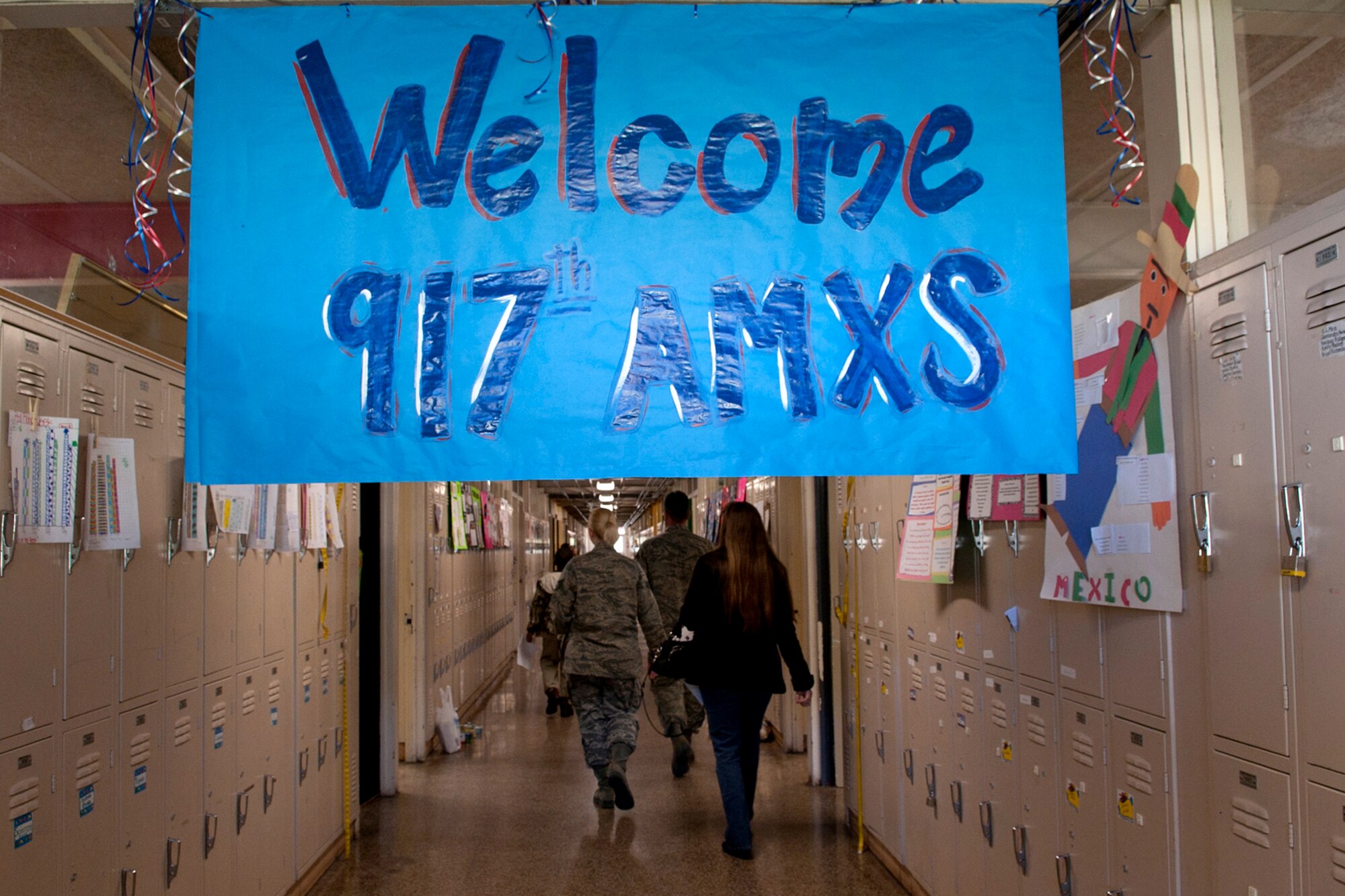 A banner hangs in the Phoenix Magnet Elementary School hallway, welcoming members of the 917th Fighter Group during a visit in Alexandria, La., Nov. 10, 2011. The school hosted a group of 917th Fighter Group personnel, who visited all 675 students, answering questions about themselves, their jobs and the Air Force Reserve. (U.S. Air Force photo by Master Sgt. Greg Steele/Released)
