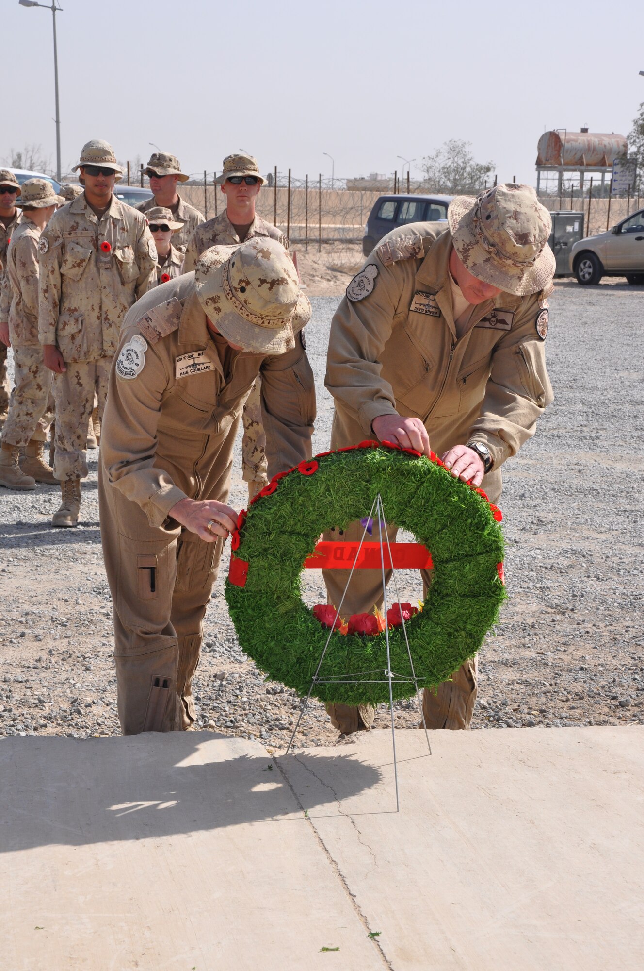 The 386th Air Expeditionary Wing joined the Royal Canadian Air Force in a ceremony to honor the Canadian holiday, Remembrance Day, Nov. 11 at an undisclosed location in Southwest Asia. (U.S. Air Force photo by Senior Airman Rachelle Elsea)
