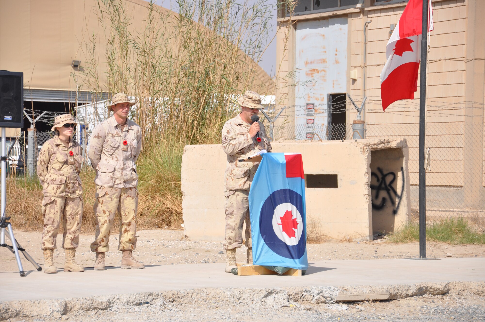 The 386th Air Expeditionary Wing joined the Royal Canadian Air Force in a ceremony to honor the Canadian holiday, Remembrance Day, Nov. 11 at an undisclosed location in Southwest Asia. (U.S. Air Force photo by Senior Airman Rachelle Elsea)
