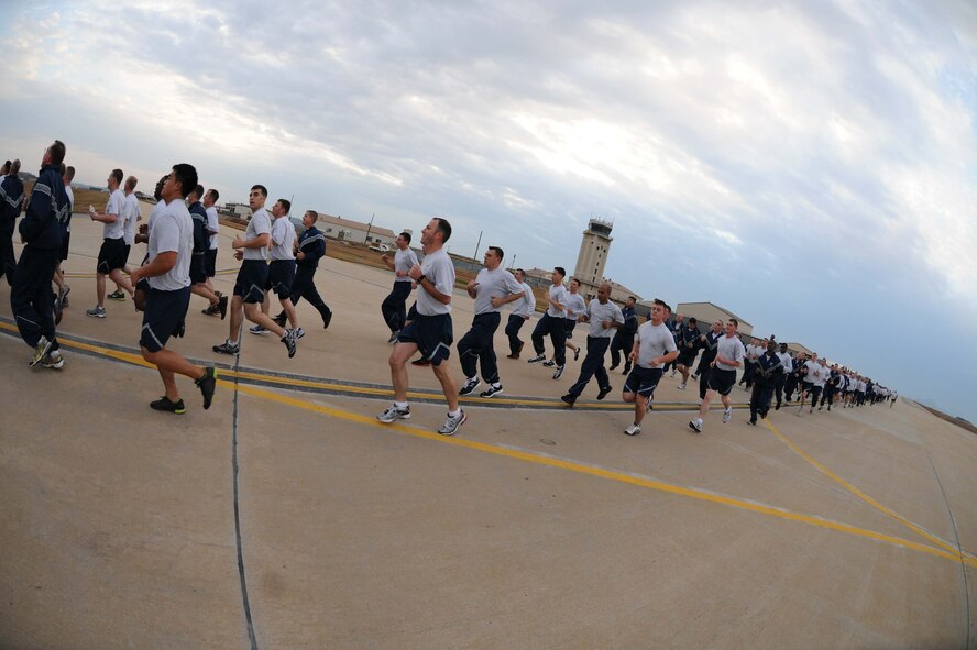 Members of the Wolf Pack participate in a warrior run at Kunsan Air Base, Republic of Korea, Nov. 10. The warrior run is a formation run and a way to boost the morale of Airmen and Soldiers. (U.S. Air Force photo by Senior Airman Brittany Y. Auld/Released)