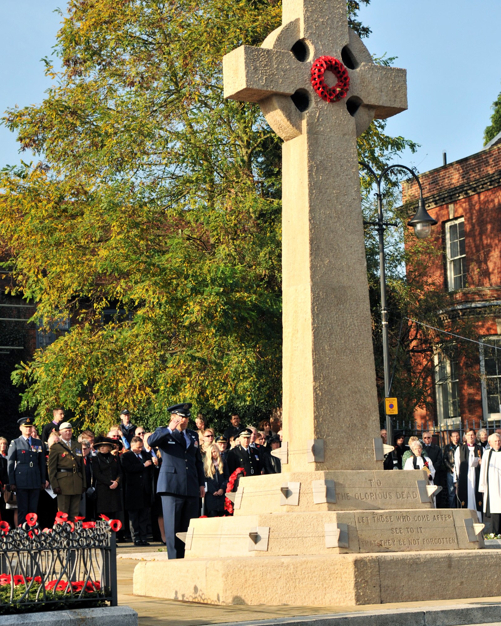 BURY ST. EDMUNDS, England – Col. Christopher Kulas, 100th Air Refueling Wing commander, renders a salute during a memorial service in Bury St. Edmunds Nov. 13, 2011. Remembrance Day is held each year on the second Sunday of November during which U.K. citizens remember and honor those Service members who lost their lives in the line of duty in World War I. (U.S. Air Force photo/Senior Airman Jerilyn Quintanilla)