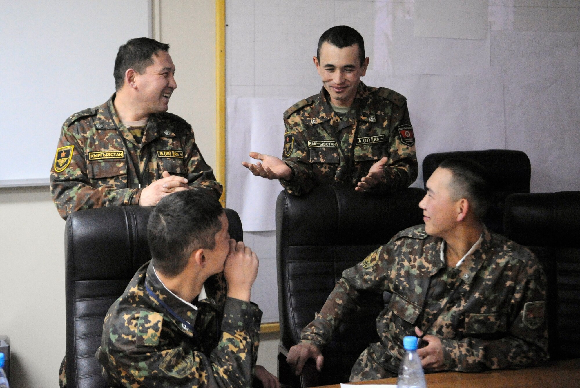 Soldiers from the Koi Tash Noncommissioned Officer Academy participate in a communications exercise during an enlisted professional military education instructor exchange at the Transit Center at Manas, Kyrgyzstan, Nov. 10. Airmen from the Transit Center and soldiers from Koi Tash participate in numerous exchanges each month, ranging from language labs to sporting events. (U.S. Air Force photo/Tech. Sgt. Tammie Moore)