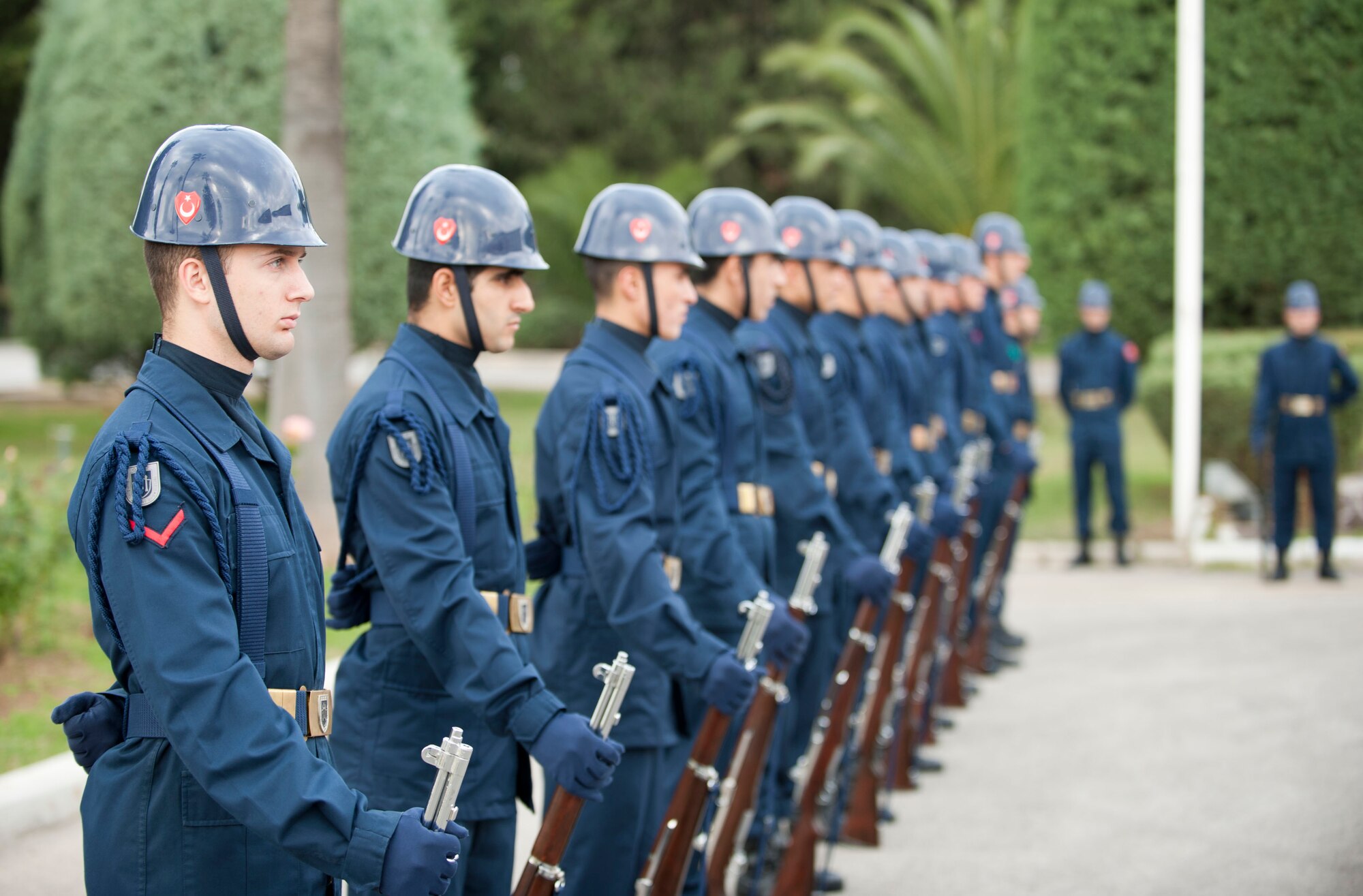 Members of the 10th Tanker Base Command stand at parade rest during the Ataturk Memorial Day Ceremony Nov. 10, 2011, at Incirlik Air Base, Turkey. Mustafa Kemal Ataturk was the founder and first president of modern Turkey. Every year on the day and time that he died, all of Turkey pauses for a moment of silence to honor him. (U.S. Air Force photo by Senior Airman Clayton Lenhardt/Released)