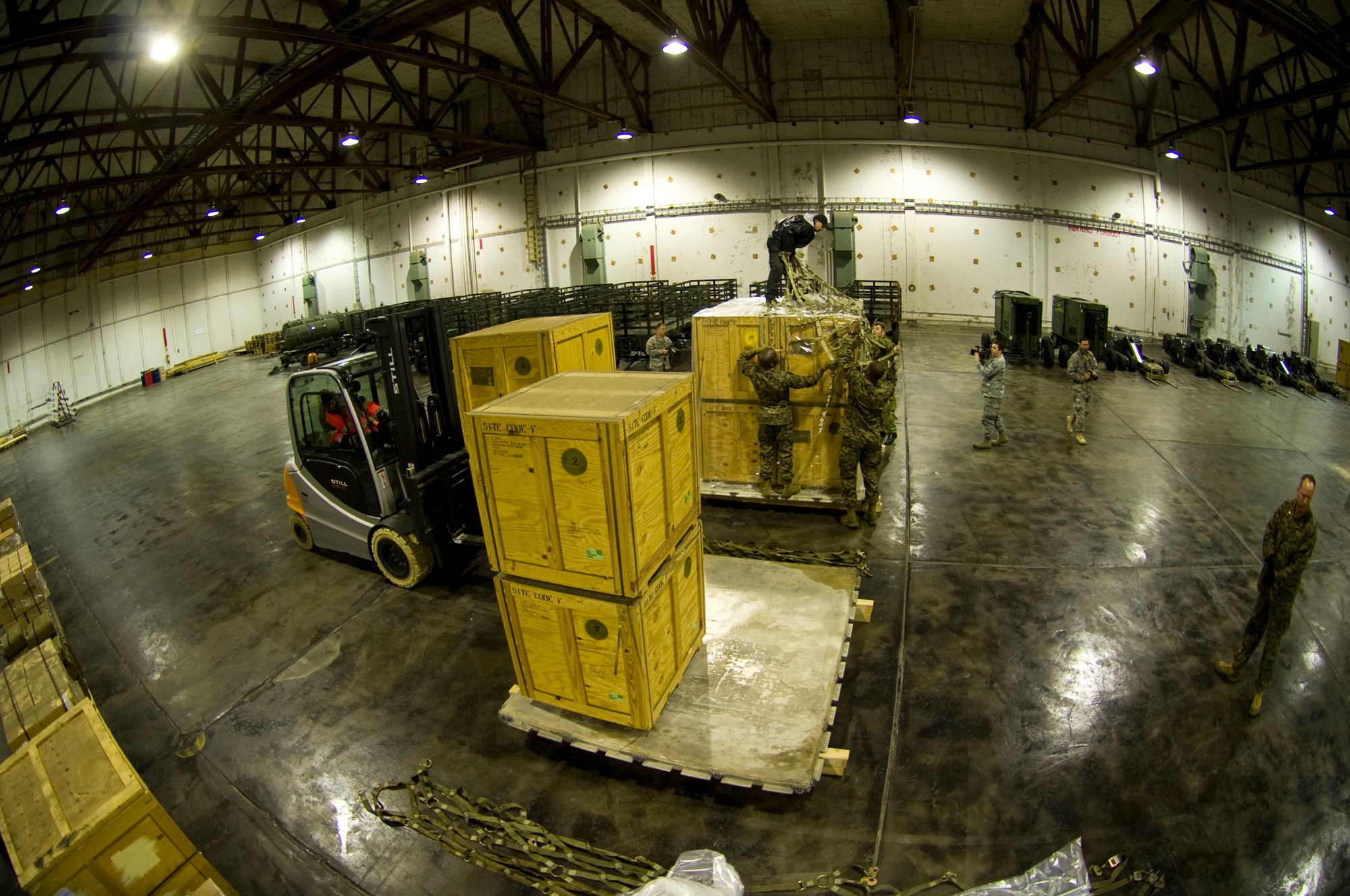 Members of the Norwegian Defense Logistic Organization/Marine Expeditionary Brigade and Marine Forces Europe prepare pallets of humanitarian supplies for transportation for Turkey, Nov. 14, 2011. The effort is in support of the Turkey-led relief efforts following the Nov. 9, and Oct. 23, 2011, earthquakes in Van province, Turkey. At the request of the Turkish government the Department of Defense has tasked U.S. European Command to airlift relief supplies to Van province.  (U.S. Air Force photo/Master Sgt. Wayne Clark, AFNE Regional News Bureau) (Released)