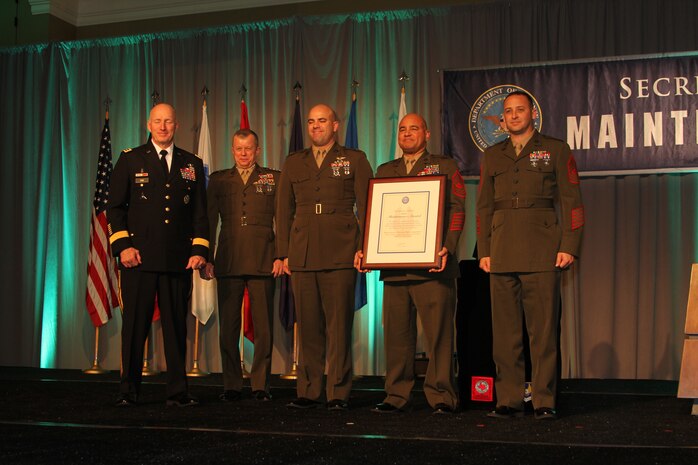 Marines from 2nd Marine Aircraft Wing accept the Secretary of Defense’s Field-level Maintenance award on behalf of Marine Tactical Electronic Warfare Squadron 1 Nov. 16, at the Fort Worth Convention Center in Fort Worth Texas. VMAQ-1 later received the DOD highest award for maintenance excellence, the Phoenix Award.