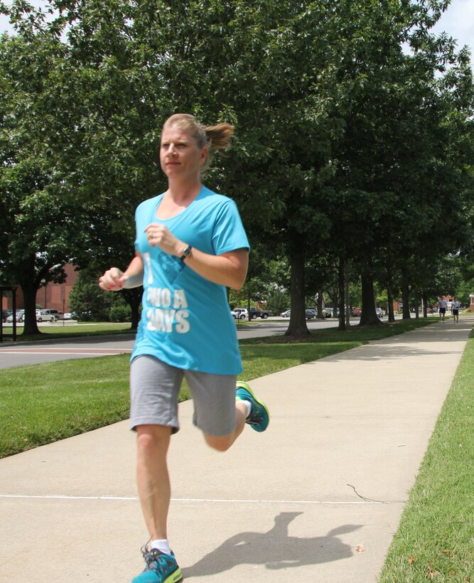 Master Sgt. Cynthia Umschied runs outdoors during good weather and speaks to others about how and why she got more involved in a better fitness workout.  She is one of the enlisted leaders pushing fitness throughout the 932nd Airlift Wing.  (U.S. Air Force photo/Major Stan Paregien)