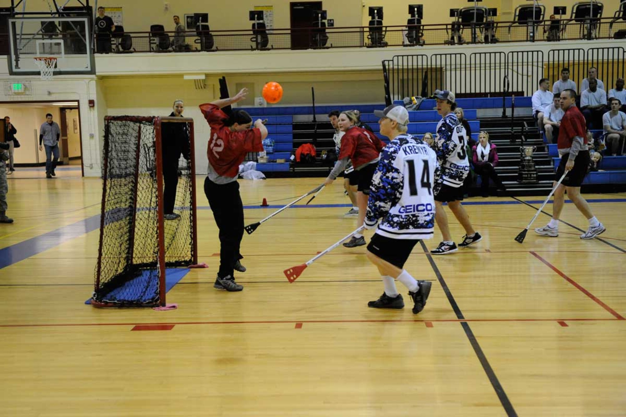 Soldiers and Airmen assigned to Joint Base Elmendorf-Richardson had a chance to play broomball against Anchorage’s ECHL professional hockey team, the Alaska Aces, during a game held at the Elmendorf fi tness center Nov. 9. The Alaska Aces won the Kelly Cup in 2010 as champions of the 19-team ECHL. They handed out free tickets to games for their military appreciation weekend at the conclusion of the game. (U.S. Air Force photo/Steve White)