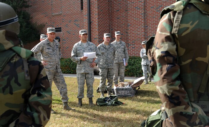 Capt. Jason Guadalupe briefs Maj. Gen. William Bender on "Warrior Week" procedures for the upcoming Operational Readiness Inspection on Joint Base Charleston Nov.15. The ORI will take place Nov.29th through Dec.6th. Bender is the Commander of United States Air Force Expenditionary Center, Joint Base McGuire-Dix-Lakehurst, N.J., and Guadalupe is the Operations Officer for the 628th Force Support Squadron. (U.S. Air Force photo/Airman 1st Class Ashlee Galloway) 