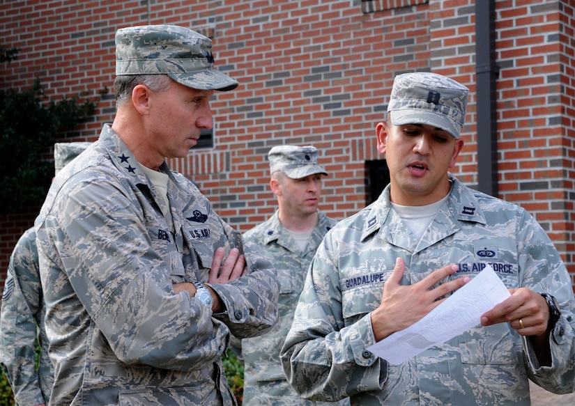 Capt. Jason Guadalupe briefs Maj. Gen. William Bender on "Warrior Week" procedures for the upcoming Operational Readiness Inspection on Joint Base Charleston Nov.15. The ORI will take place Nov.29th through Dec.6th. Bender is the Commander of United States Air Force Expenditionary Center, Joint Base McGuire-Dix-Lakehurst, N.J. and Guadalupe is the Operations Officer for the 628th Force Support Squadron. (U.S. Air Force photo/Airman 1st Class Ashlee Galloway) 