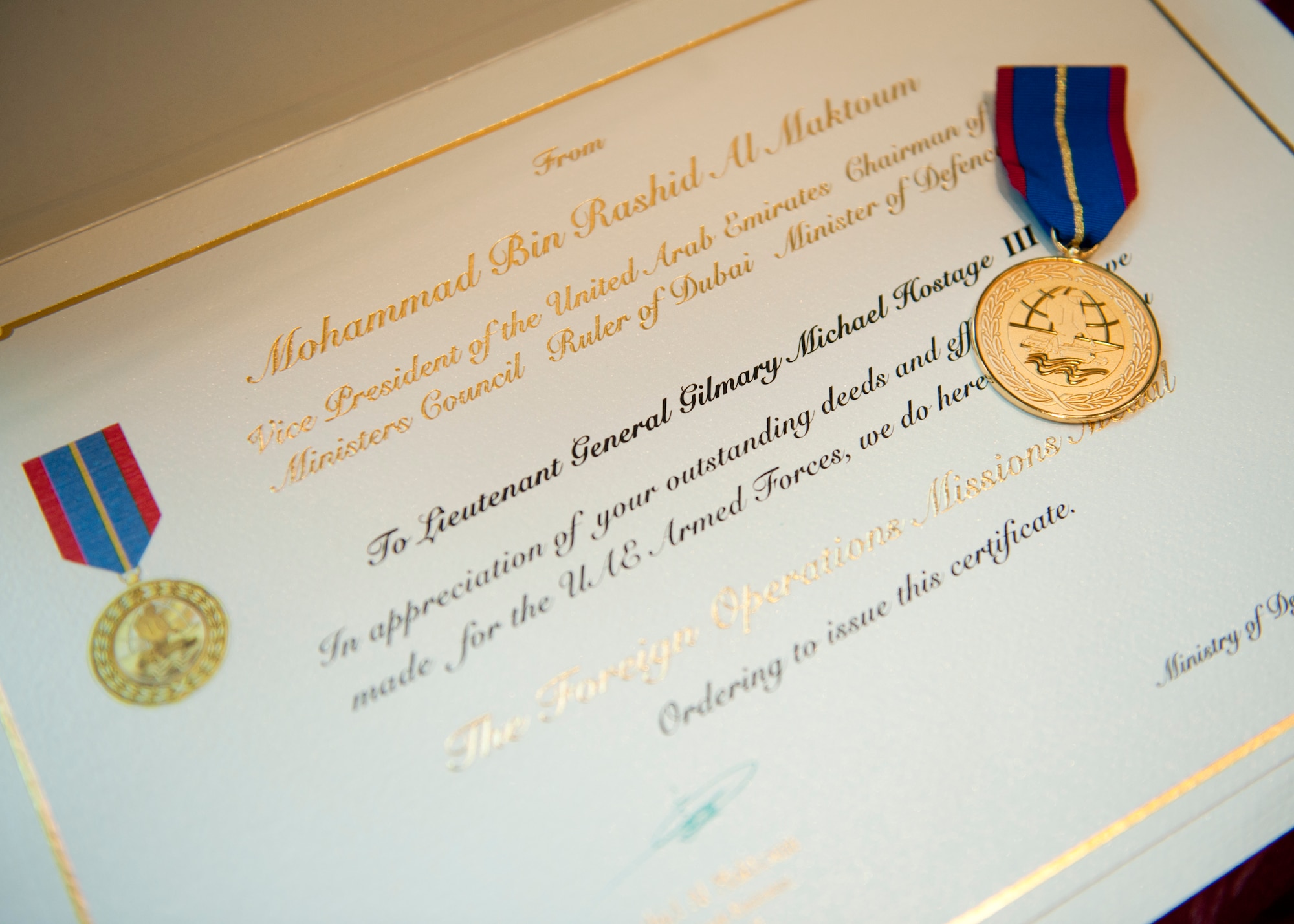 The Foreign Operations Medal and accompanying certificate that were presented to Air Combat Command commander, U.S. Air Force Gen. Mike Hostage III at the UAE Embassy, Washington D.C. on Nov. 15, 2011. (U.S. Air Force photo by Jim Varhegyi/Released)