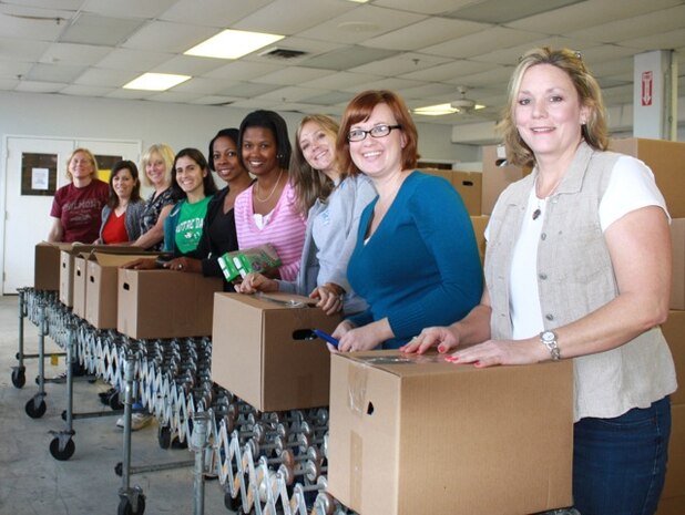 Joint Base Charleston- Air Base Team Charleston Spouses Club donated 56 pounds of food and $500 to the Lowcountry Food Bank.  The canned goods were used to help feed 41 families.
