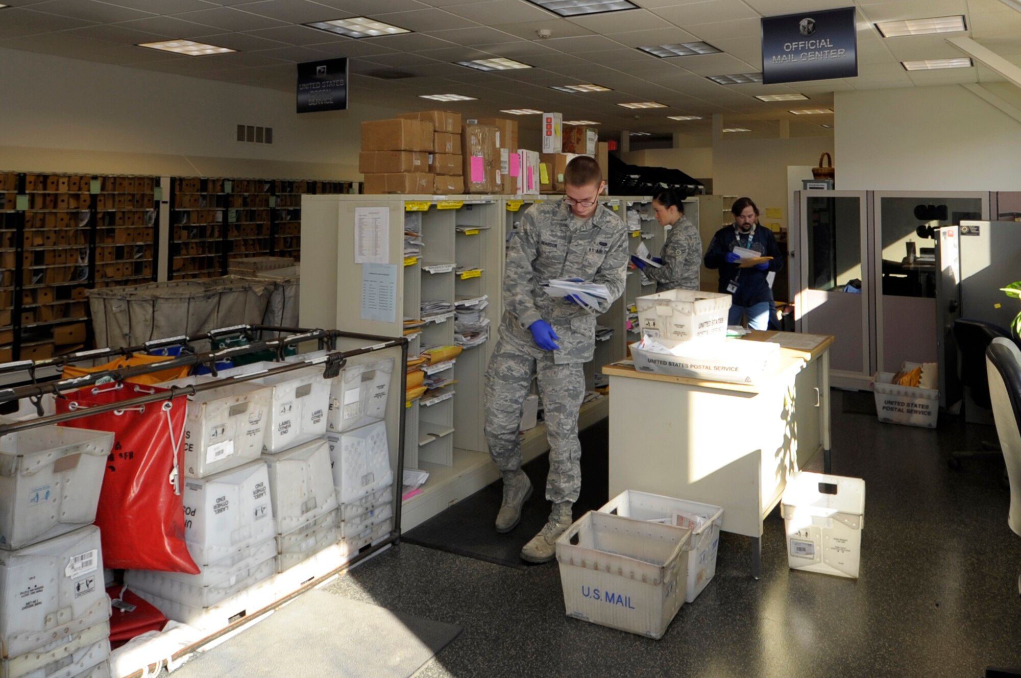 VANDENBERG AIR FORCE BASE, Calif. -- Official mail center personnel sort through mail in the new Official Mail Center location here Wednesday, Nov. 16, 2011. The Official Mail Center is collocated with the Vandenberg Post Office at 100 Community Loop, Building 10373.
(U.S. Air Force photo/Jerry E. Clemens, Jr.)
