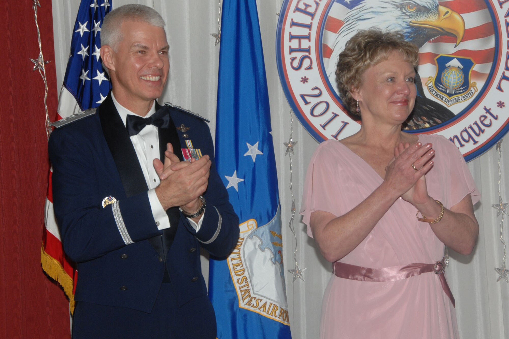 HANSCOM AIR FORCE BASE, Mass. – Lt. Gen. CR Davis, Electronic Systems Center commander, and Barb Shiely applaud the winners during the 2011 Shiely, Wright and O’Neil awards banquet at the Minuteman Commons Nov. 10. Shiely is the daughter of Maj. Gen. Albert R. Shiely Jr., for whom the Shiely award is named. Her father donated the original trophy upon retiring from the Air Force in March 1974. (U.S. Air Force photo by Linda LaBonte Britt)