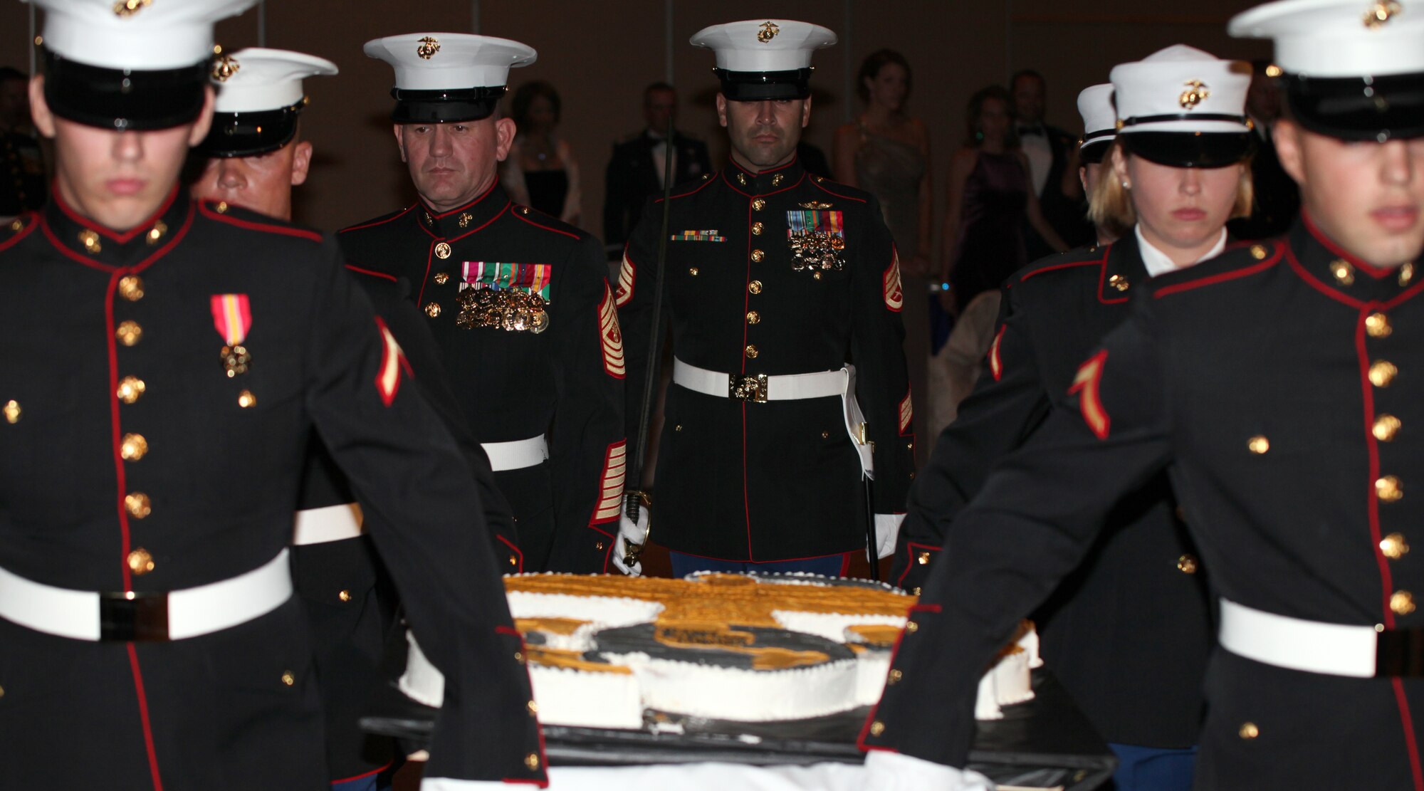 SAN ANGELO, Texas -- Marines from the Marine Corps Detachment at Goodfellow Air Force Base bring out Service's birthday cake Nov. 10 during the Marine Corps Ball, celebrating 236 years. (Courtesy photo/ Army Staff Sgt. Michael Carlson)