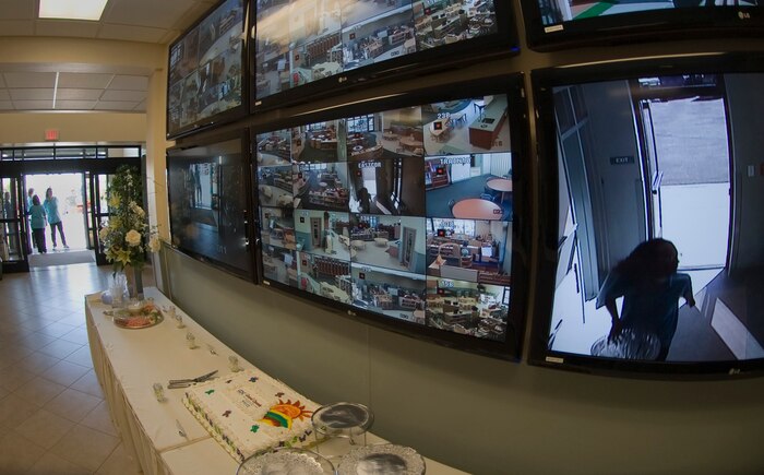 The Child Development Center held its grand opening Nov. 14, 2011, on Nellis Air Force Base, Nev. Television screens in the main entrance are used for monitoring the CDC to show all aspects of the building for the children's safety. (U.S Air Force photo by Senior Airman Stephanie Rubi / Released)