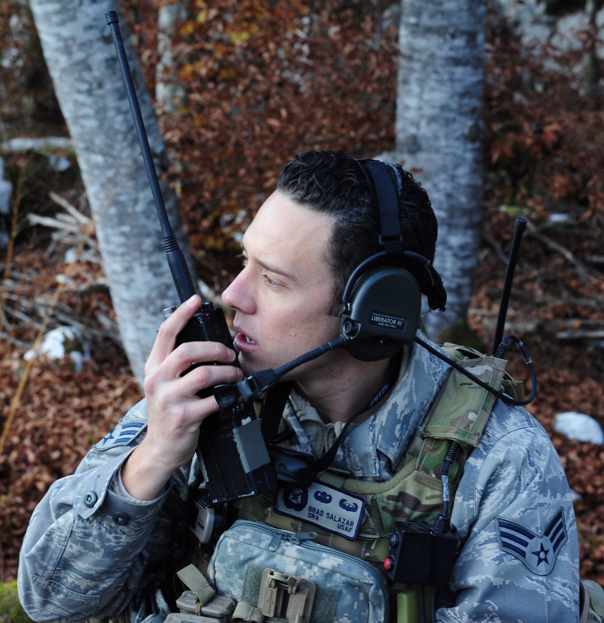 Senior Airman Brad Salazar, 8th Air Support Operations Squadron air control party operator, calls in a simulated air strike Nov. 15 at Barcis, Italy. This training is to help refine techniques and procedures of tactical command and control of air power assets. (U.S. Air Force photo/Airman 1st Class Briana Jones)

