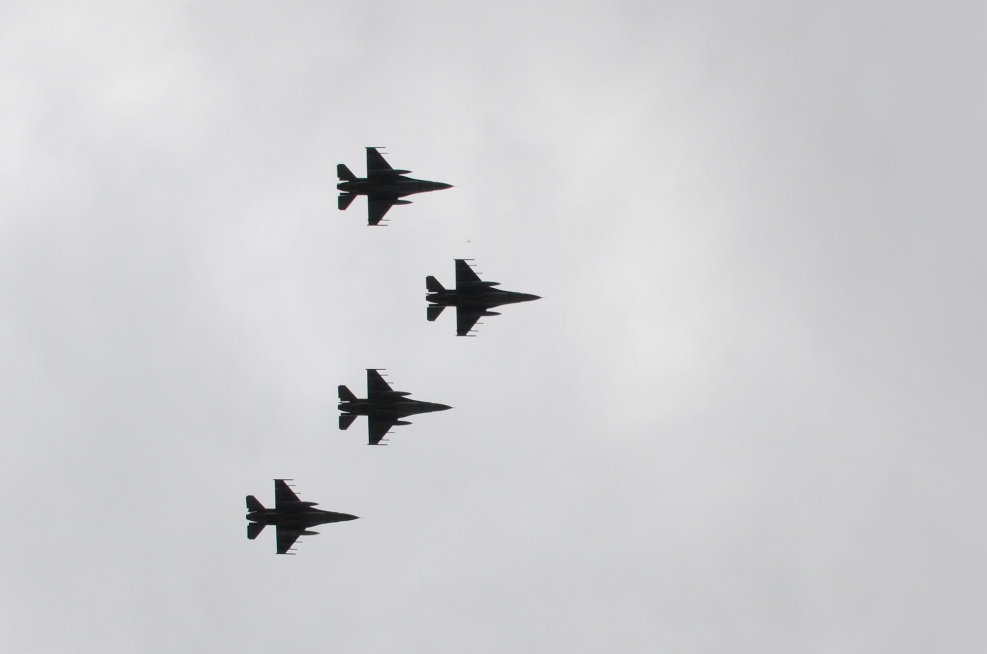 F-16 fighter aircraft from the 144th Fighter Wing, California Air National Guard, fly over head at the start of the Veterans Day Parade in Fresno, Calif. on Nov. 11, 2011.  This is the 92nd year for the parade and is considered to be the largest event of its kind west of the Mississippi.  (U.S. Air Force photo by SMSgt. Chris Drudge)