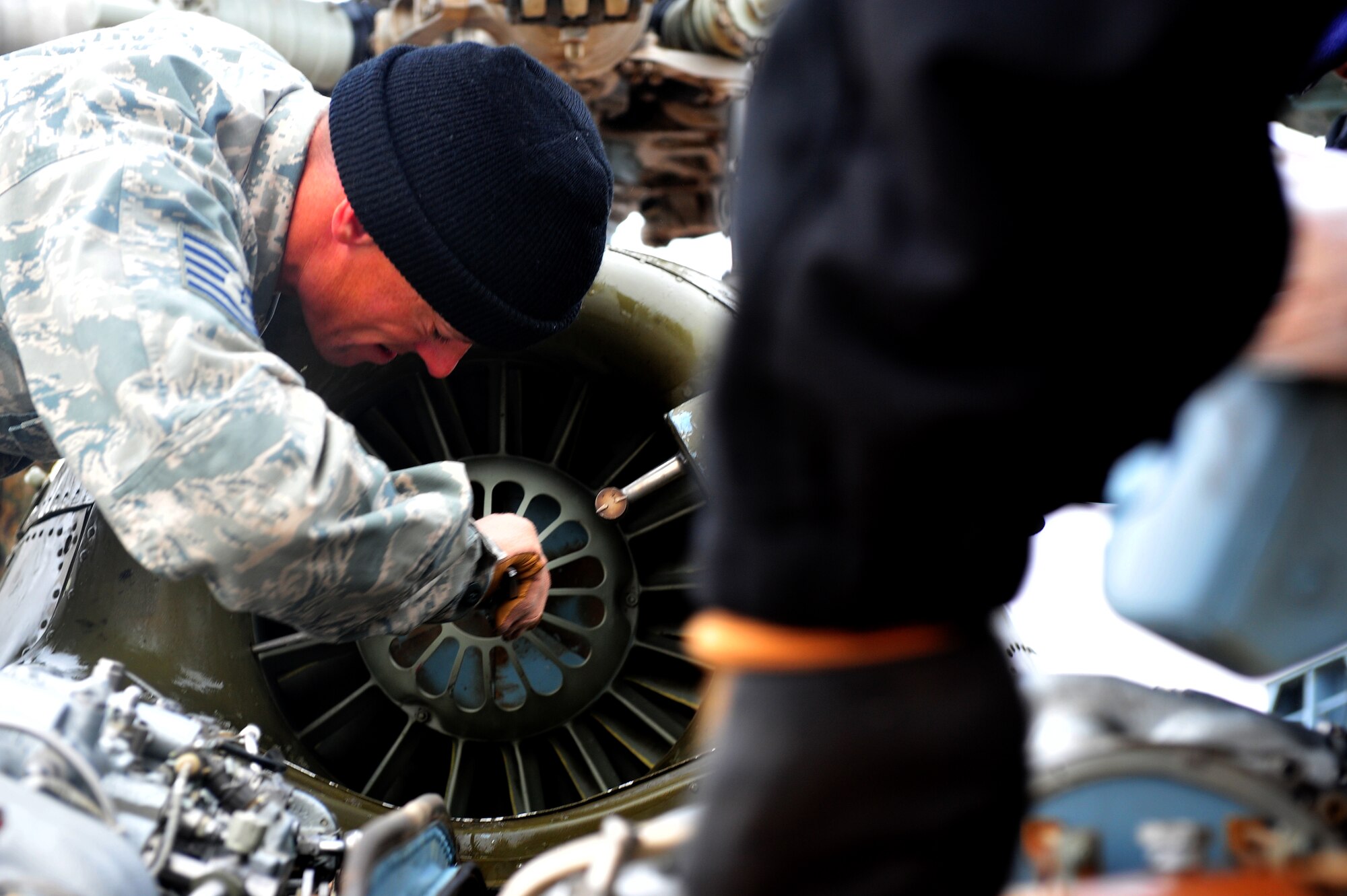 Tech. Sgt. Keith McCarthy, 838th Air Expeditionary Advisory Group Detachment 1, maintenance air adviser, opens the air intake during preflight checks before a training flight over Herat City, Afghanistan, Nov. 10, 2011. The 838th AEAG Airmen advise Afghan soldiers on the maintenance, operations, and security of the Mi-17 helicopter. McCarthy is deployed from the 723th Aircraft Maintenance Sq. at Moody AFB, Ga. (U.S. Air Force Photo/SrA Tyler Placie)