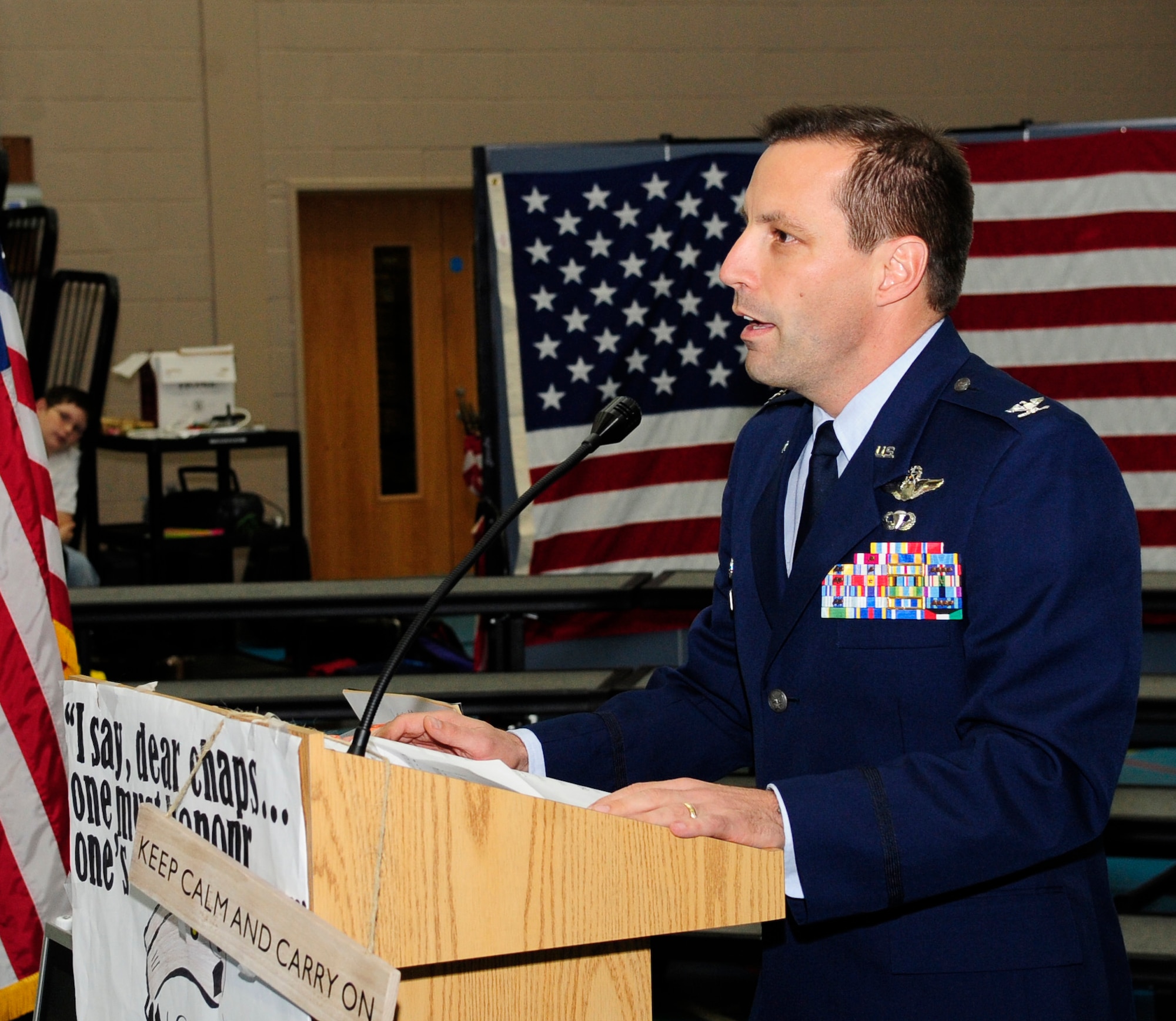 RAF FELTWELL, England – Col. Christopher Kulas, 100th Air Refueling Wing commander, speaks about the importance of Remembrance Day during an event held at RAF Feltwell Middle School Nov. 9, 2011. The event was held to help teach schoolchildren the importance of remembering those who died so that others may stay free. (U.S. Air Force photo/Senior Airman Ethan Morgan)