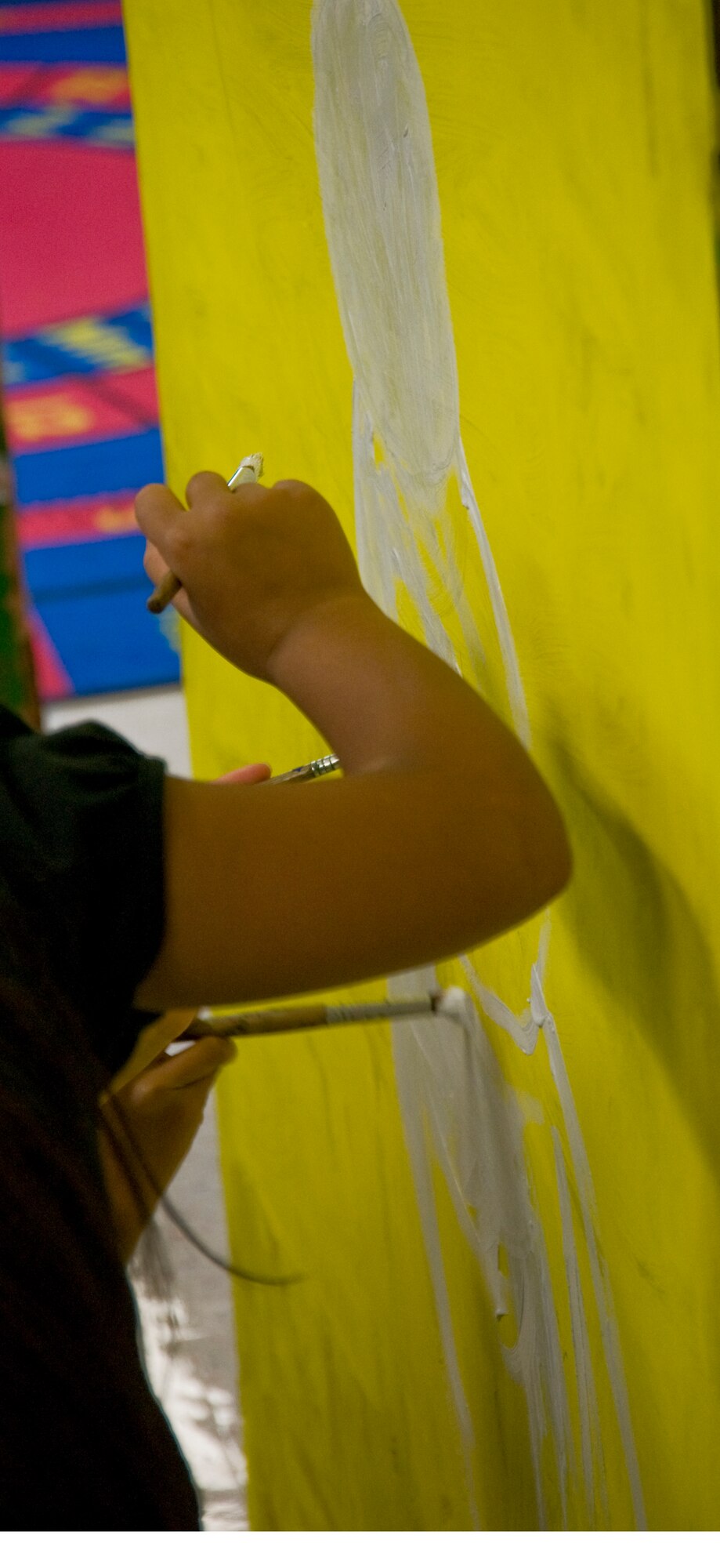 ANDERSEN AIR FORCE BASE, Guam--Children from Andersen Elementary School painted boxes that will be filled with toys, clothing and goods for Operation Christmas Drop Nov. 15 here.Throughout the week of Nov. 14, every grade will participate in decorating these boxes. Operation Christmas Drop is a non-profit organization powered by volunteers from Andersen AFB and the local community and has to date,
dropped more than 800,000 pounds of goods throughout the surrounding
islands. Fundraising for this Operation Christmas Drop is scheduled to
kick-off with a 5K run/walk Nov. 19, followed by a bake sale at the Base
Exchange Nov. 26. In addition to fundraisers, individual and group donations
may also be made to the cause. (U.S Air Force photo by Staff Sgt. Alexandre
Montes)
