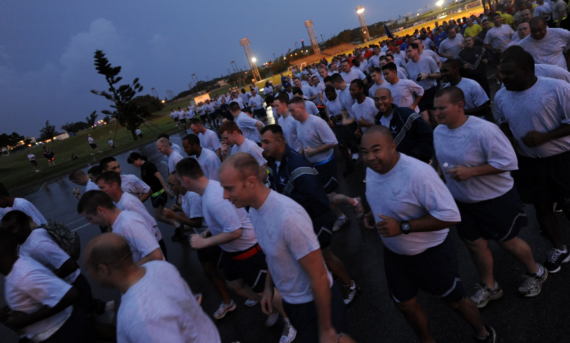 Members of Team Kadena participate in the Wingman Day run on Kadena Air Base, Japan, Nov. 18, 2011. Wingman Day is designed to improve the resiliency of individuals through structured discussion in small groups and team-building exercises at the squadron level. (U.S. Air Force photo/Senior Airman Jarvie Z. Wallace/Released)