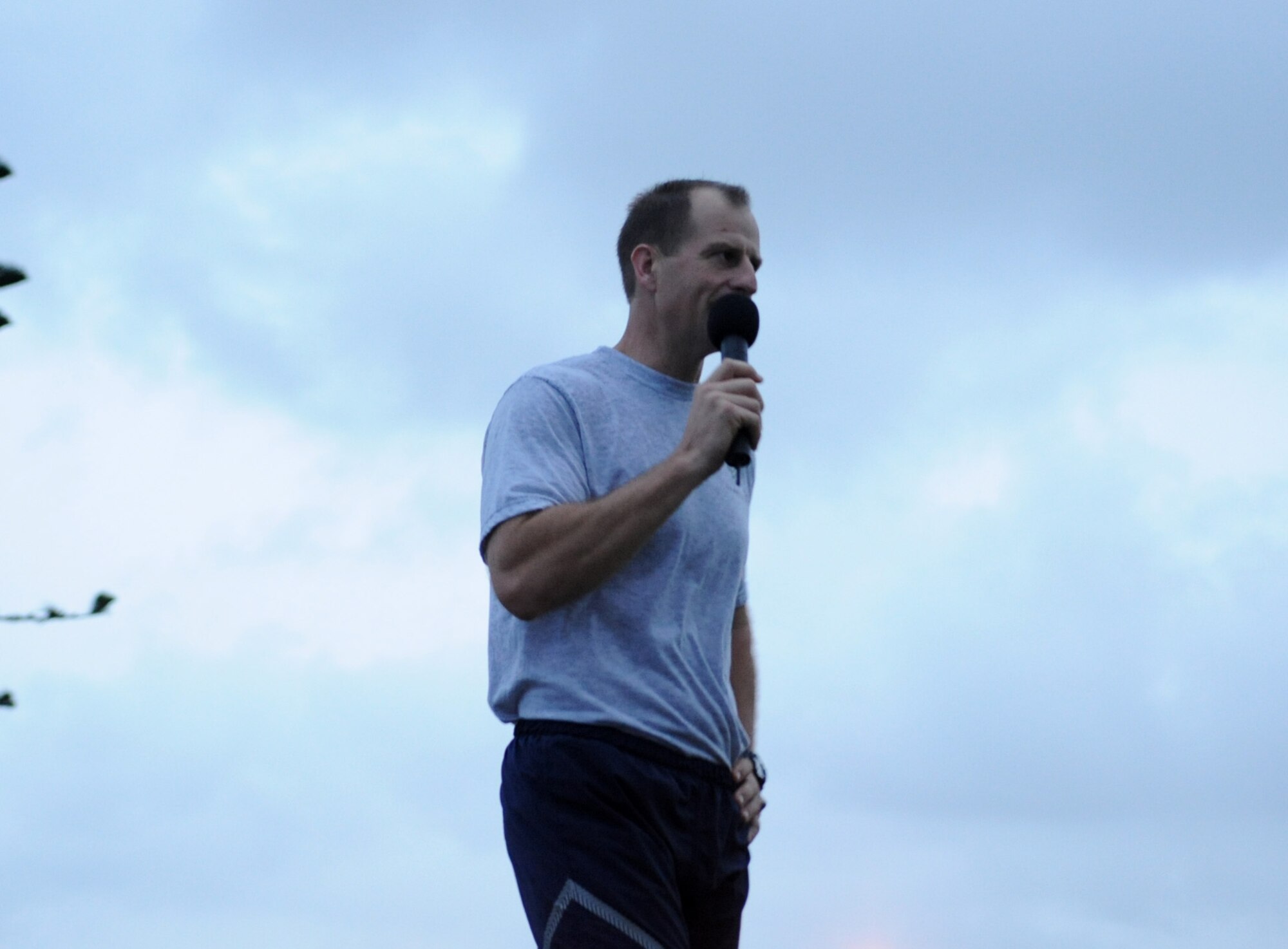 U.S. Air Force Col. Corey Martin, 18th Wing vice commander, gives a speech prior to the start of the Wingman Day run on Kadena Air Base, Japan, Nov. 18, 2011. Wingman Day is designed to improve the resiliency of individuals through structured discussion in small groups and team-building exercises at the squadron level. (U.S. Air Force photo/Senior Airman Jarvie Z. Wallace/Released)