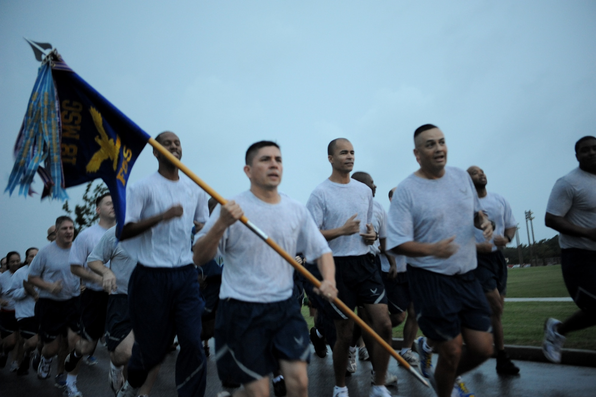 Airmen from the 18th Mission Support Group participate in the Wingman Day run on Kadena Air Base, Japan, Nov. 18, 2011. Wingman Day is designed to improve the resiliency of individuals through structured discussion in small groups and team-building exercises at the squadron level. (U.S. Air Force photo/Senior Airman Jarvie Z. Wallace/Released)