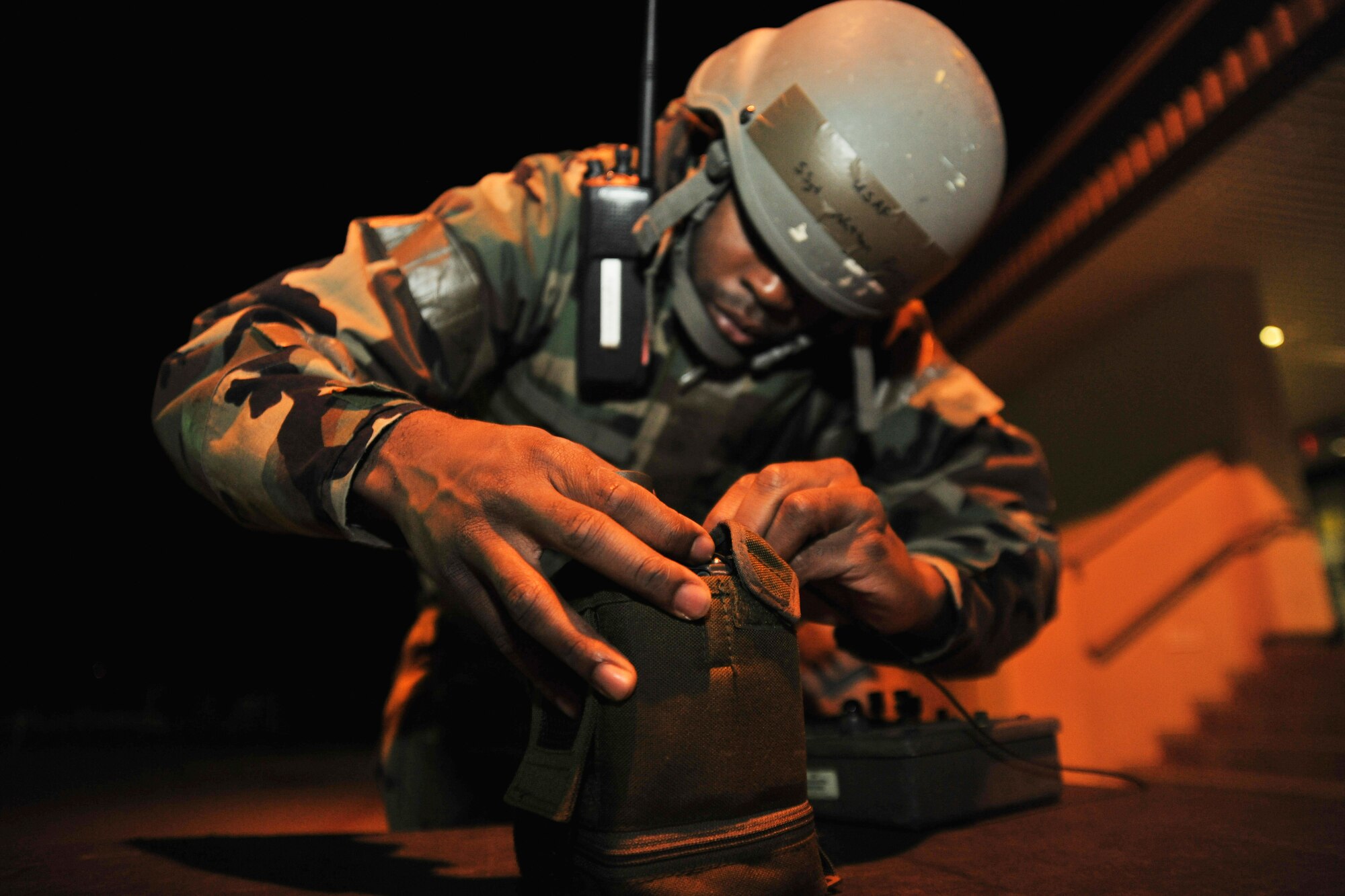 Staff Sgt. Nathan Patrick, 8th Maintenance Operations Squadron readiness support team member, sets up a joint chemical agent detector during exercise Beverly Bulldog 11-3, at Kunsan Air Base, Republic of Korea, Nov. 17, 2011. The readiness flight plans for and assists in protecting people and assets during disasters, major accidents and hostile actions. They help ensure rapid response to and recovery from the effects of such incidents. (U.S. Air Force photo by Senior Airman Brittany Y. Auld/Released)