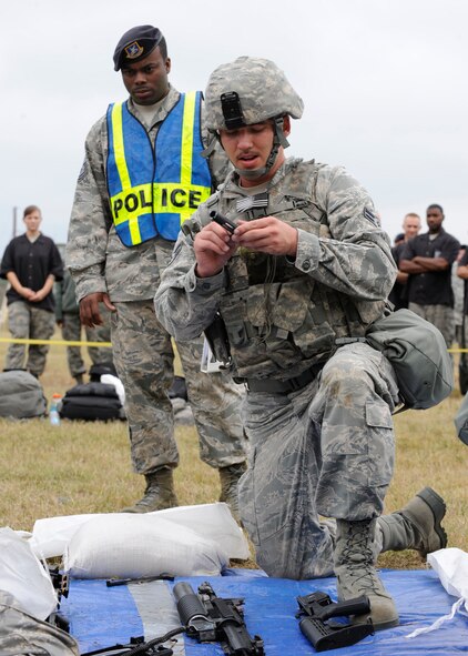 CAMP MINDEN, La. - Airman First Class Cody Scantland, 509th Security Forces Squadron, assembles a M4 Rifle during the weapons assembly phase of the mental and physical challenge for the second annual Global Strike Challenge at Camp Minden, La., Nov. 7. The competition includes security forces along with missile and bomber forces from Air Force Global Strike Command. The teams have the opportunity to participate in innovative thinking, teamwork and esprit de corps that are central to the GSC mission. The score-posting event will be held Nov. 8-9 and will reveal the winners of The Best Missile and Bomber Wing of Air Force Global Strike Command. 