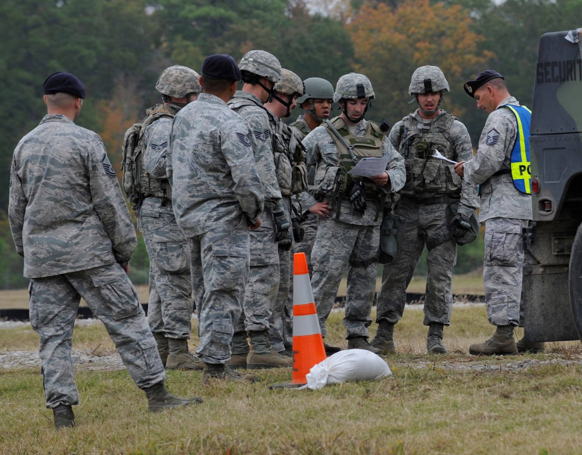 CAMP MINDEN, La. - The 509 th Security Forces Squadron reviews the rules and regulations during the Humvee push phase during the mental and physical challenge during the second annual Global Strike Challenge at Camp Minden, La., Nov. 7. The competition includes security forces along with missile and bomber forces from Air Force Global Strike Command. The teams have the opportunity to participate in innovative thinking, teamwork and esprit de corps that are central to the GSC mission. The score-posting event will be held Nov. 8-9 and will reveal the winners of The Best Missile and Bomber Wing of Air Force Global Strike Command. (U.S. Air Force photo/Staff Sgt. Alexandra M. Boutte) (RELEASED)