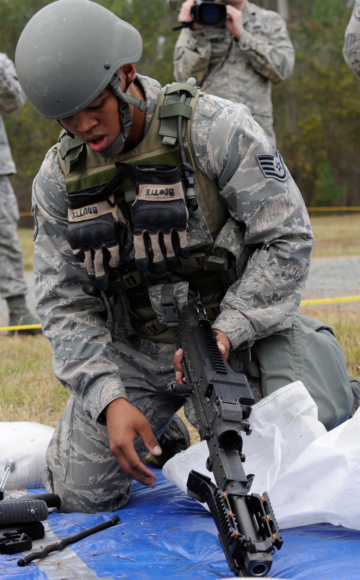 CAMP MINDEN, La. - Staff Sgt. Michael Boutte, Jr., 509th Security Forces Squadron, assembles a M240B Machine Gun during the mental and physical challenge during the second annual Global Strike Challenge at Camp Minden, La., Nov. 7. The competition includes security forces along with missile and bomber forces from the Air Force Global Strike Command. The teams have the opportunity to participate in innovative thinking, teamwork and esprit de corps that are central to the GSC mission. (U.S. Air Force photo/Staff Sgt. Alexandra M. Boutte) (RELEASED)