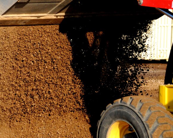 Members of the 9th Civil Engineer Squadron dirt boy crew level an area on Beale Air Force Base, Calif., November 16, 2011. The crew was leveling the land to prevent flooding. (U.S. Air Force photo by Senior Airman Sandra Healy)