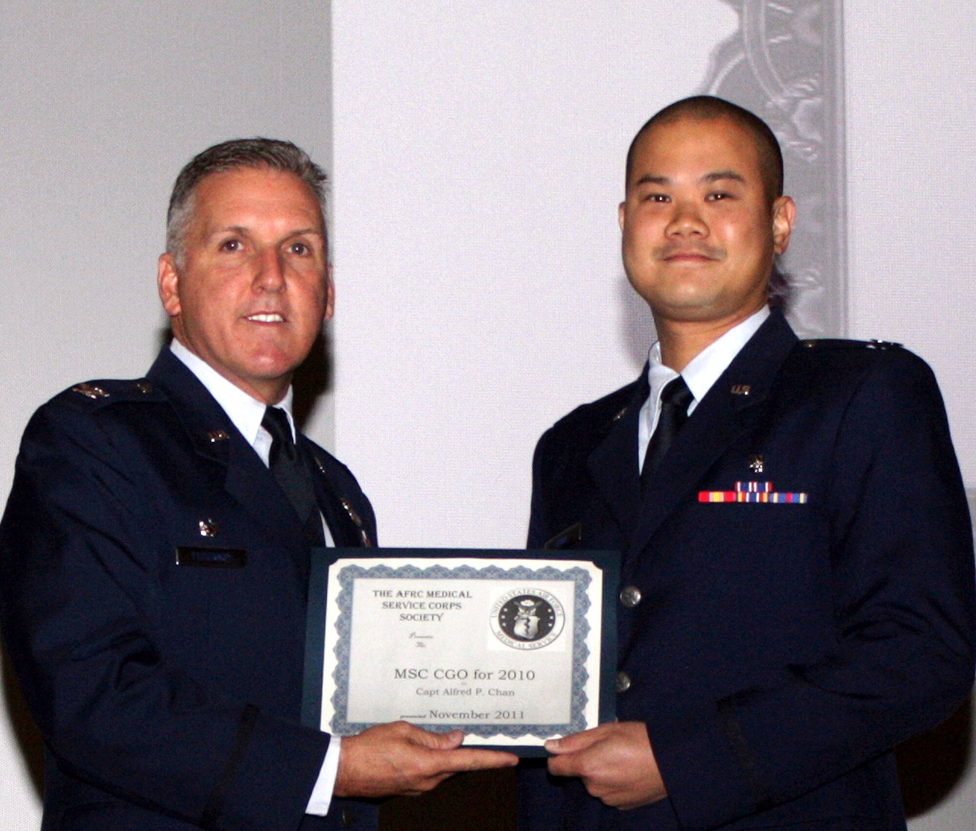 TRAVIS AIR FORCE BASE, Calif. -- At the Nov. 6 Commander's Call, Capt. Alfred Chan was recognized as the Medical Service Corps Society Company Grade Officer of the Year for 2010. (U.S. Air Force photo/Senior Amn. Amelia Leonard). 