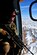 Tech. Sgt. Christian Corella, covers his sector from the door of an Afghan Air Force Mi-17 during an emergency resupply flight Nov. 11, 2011, through western Afghanistan. The U.S. and Afghan flight crews provided supplies to a remote Afghan border patrol outpost. Corella is an aerial gunner from the 88th Test and Evaluation Squadron at Nellis Air Force Base, Nev. (U.S. Air Force photo/SrA Tyler Placie) 

