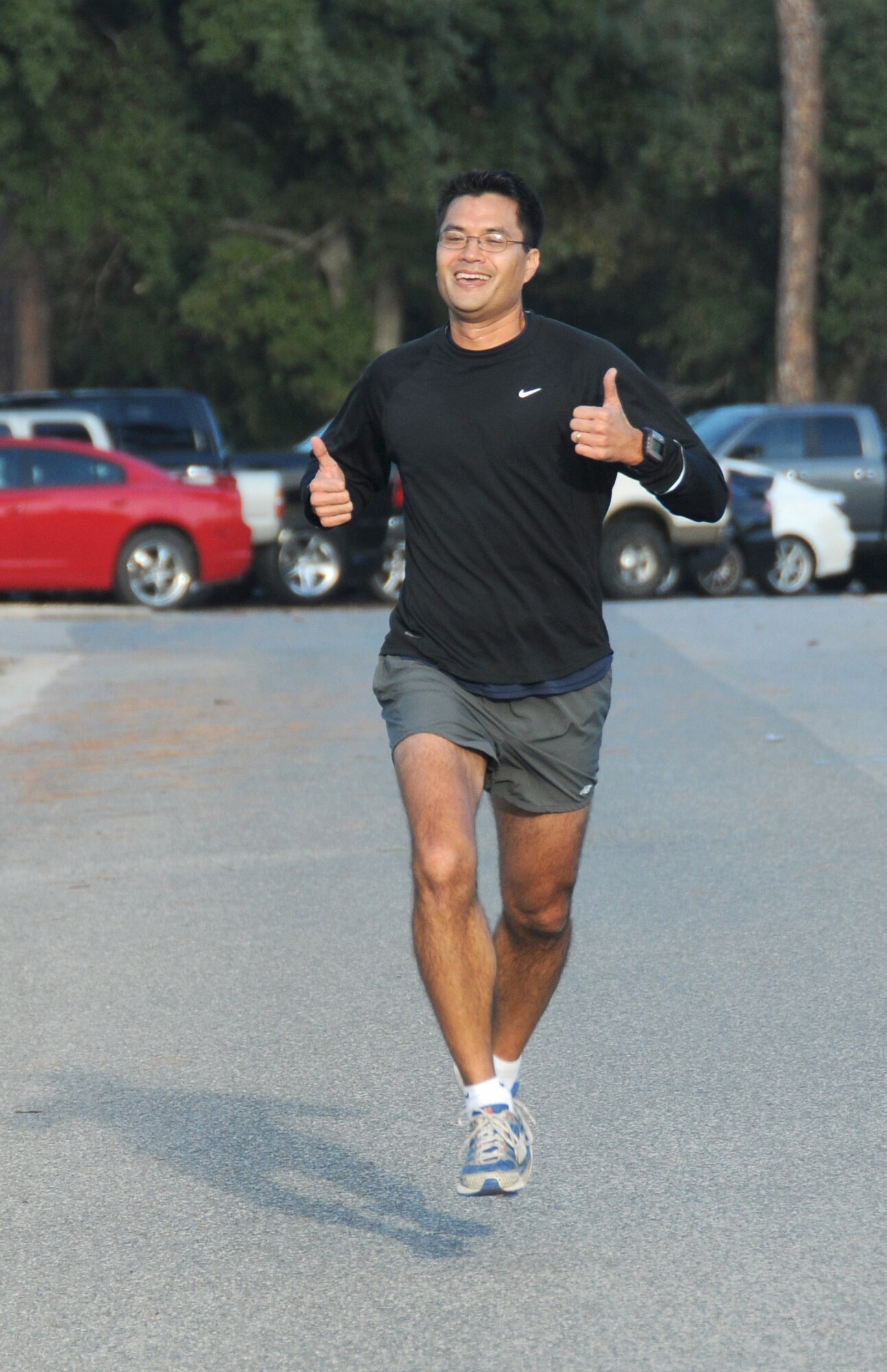 Geoffrey Sasaki, 81st Diagnostic and Therapeutic Squadron, finished the Great American Smokeout Run in first place with a time of 20 minutes, 31 seconds, at Keesler Air Force Base, Miss., Nov. 17, 2011.  (U.S. Air Force photo by Kemberly Groue)