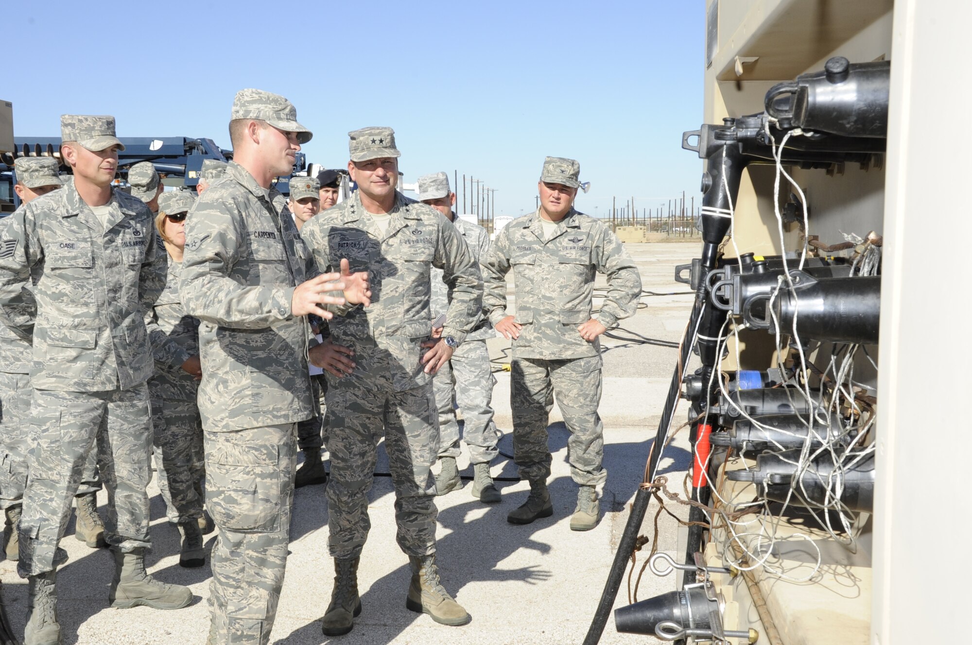 Maj. Gen. Leonard Patrick receives a brief on the Contingency Electrical Power System by Airman Joshua Carpenter during his tour of the 366th Training Squadron Electrical Systems Apprentice Course, Nov. 16, at Sheppard Air Force Base, Texas. Patrick, Second Air Force commander, paid a visit to Sheppard Nov. 14-16 to tour the 82nd Training Wing and speak with Sheppard members. (U.S. Air Force photo/Frank Carter)