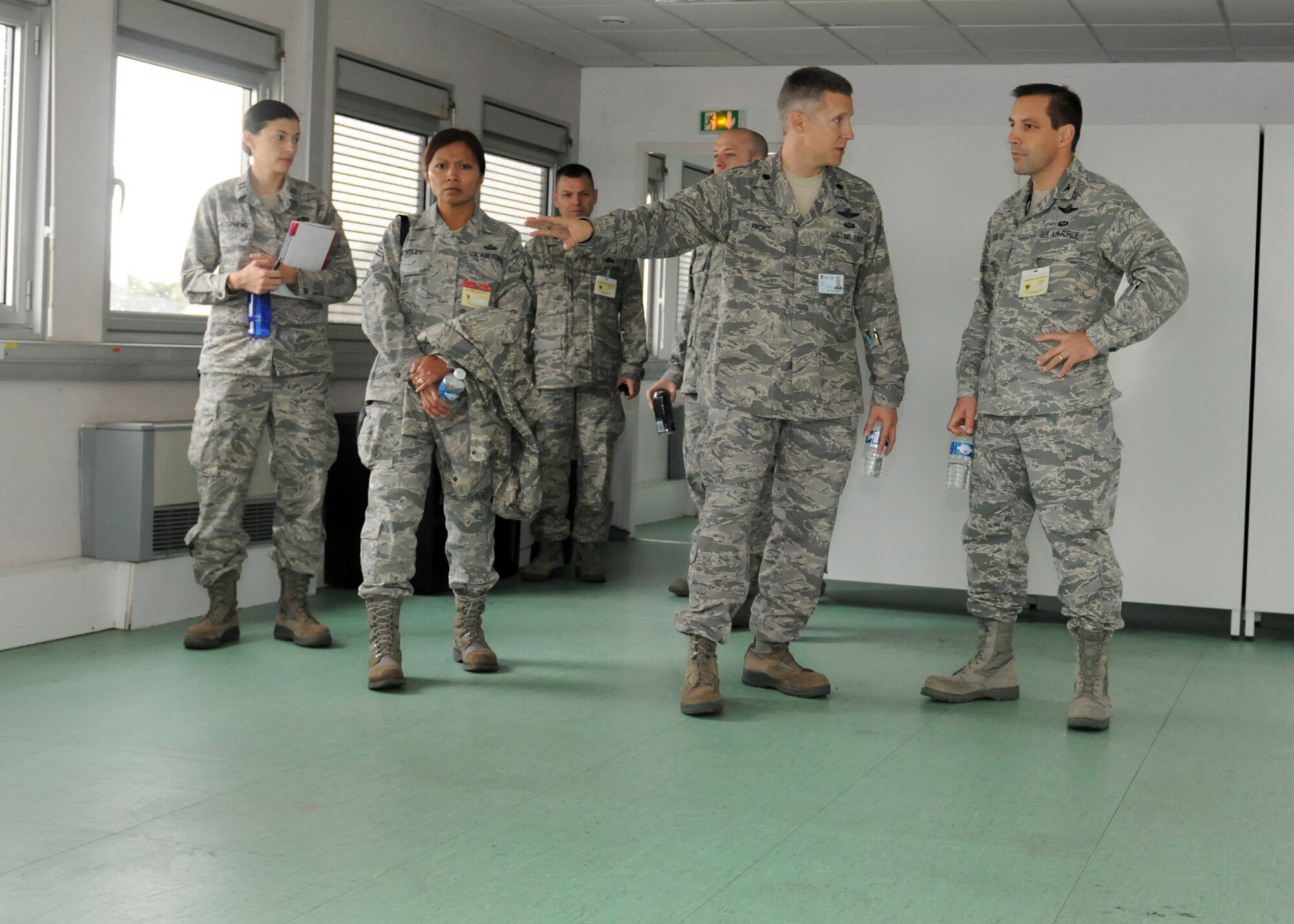 ISTRES, France – Lt. Col. Robert Ricks, 351st Expeditionary Air Refueling Squadron commander, shows Col. Christopher Kulas, 100th Air Refueling Wing commander (right), the condition of the facilities of Base Aérienne 125, Istres, France, Nov. 8, 2011.  Kulas toured the facilities to ensure they were returned to the French hosts in the clean and operational manner in which they were found.  (U.S. Air Force photo/Staff Sgt. Tabitha M. Lee) 