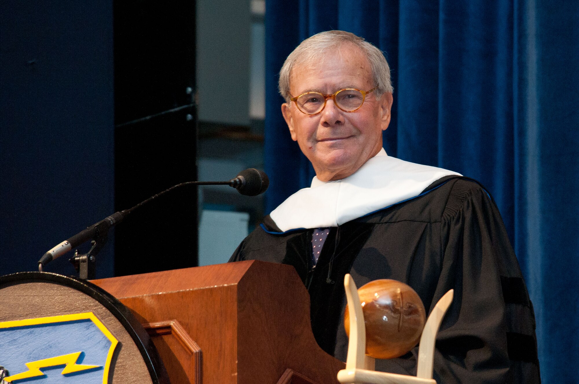 Tom Brokaw speaks during a honorary degree ceremony held Monday. Lt. Gen. David Fadok, commander and president of the Air University, Dr. Bruce Murphy, vice president for academic affairs, and Dr. Jack Hawkins, chair of the AU Board of Visitors, presented Tom Brokaw with a hood and diploma recognizing his honorary Doctor of Letters degree. (Air Force photo/Donna Burnett)