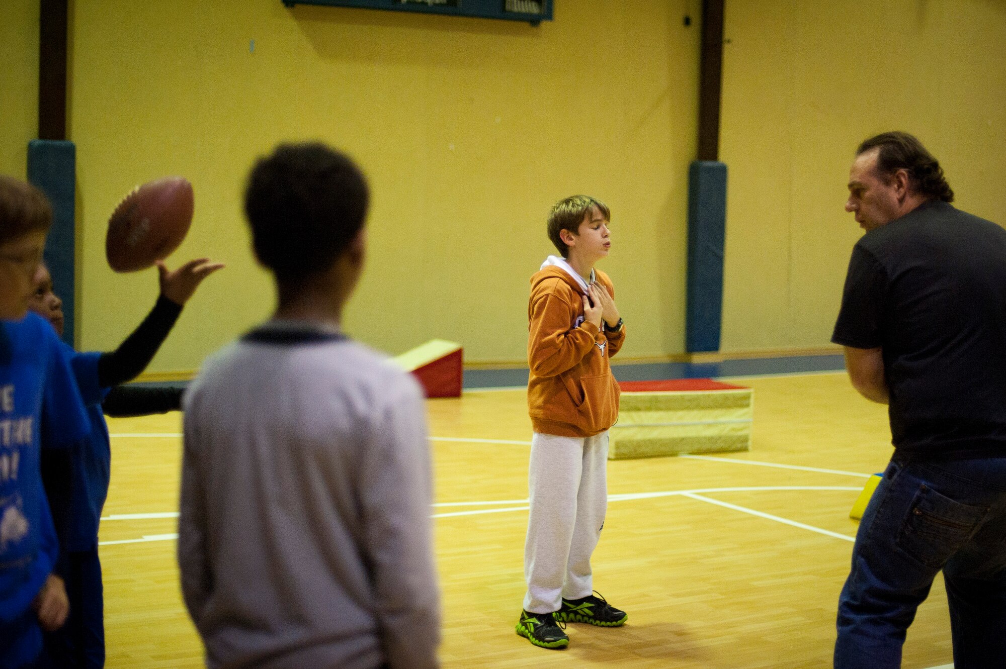 A child prepares for another round of drills during a football mini-camp Nov. 16, 2011, at Incirlik Air Base, Turkey. The camp, hosted by the youth center, was held Nov. 14-18 in lieu of the youth football season and featured instruction on a variety of techniques for beginning players. (U.S. Air Force photo by Tech. Sgt. Michael B. Keller)