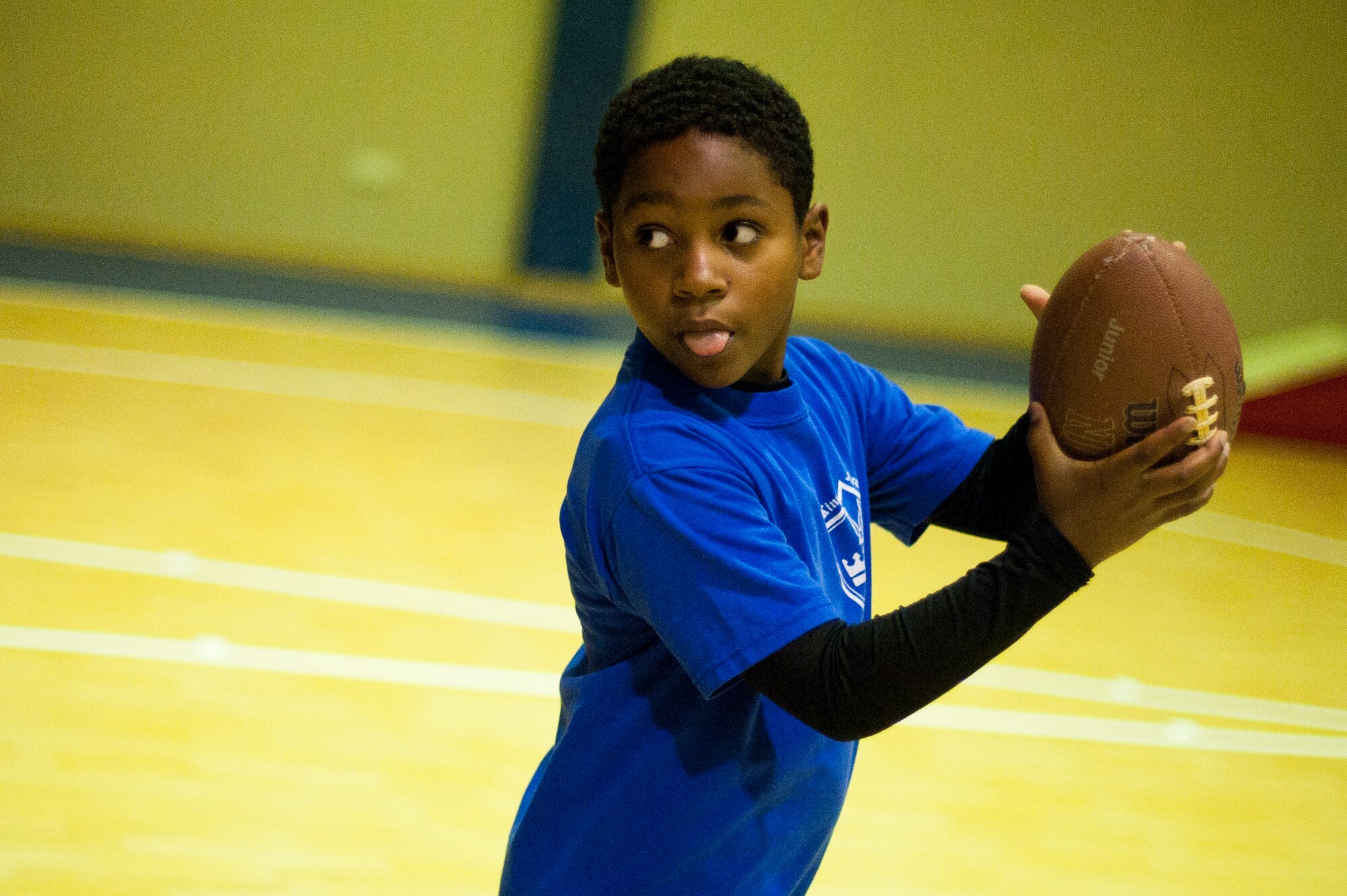 A child prepares for another round of drills during a football mini-camp Nov. 16, 2011, at Incirlik Air Base, Turkey. The camp, hosted by the youth center, was held Nov. 14-18 in lieu of the youth football season and featured instruction on a variety of techniques for beginning players. (U.S. Air Force photo by Tech. Sgt. Michael B. Keller)