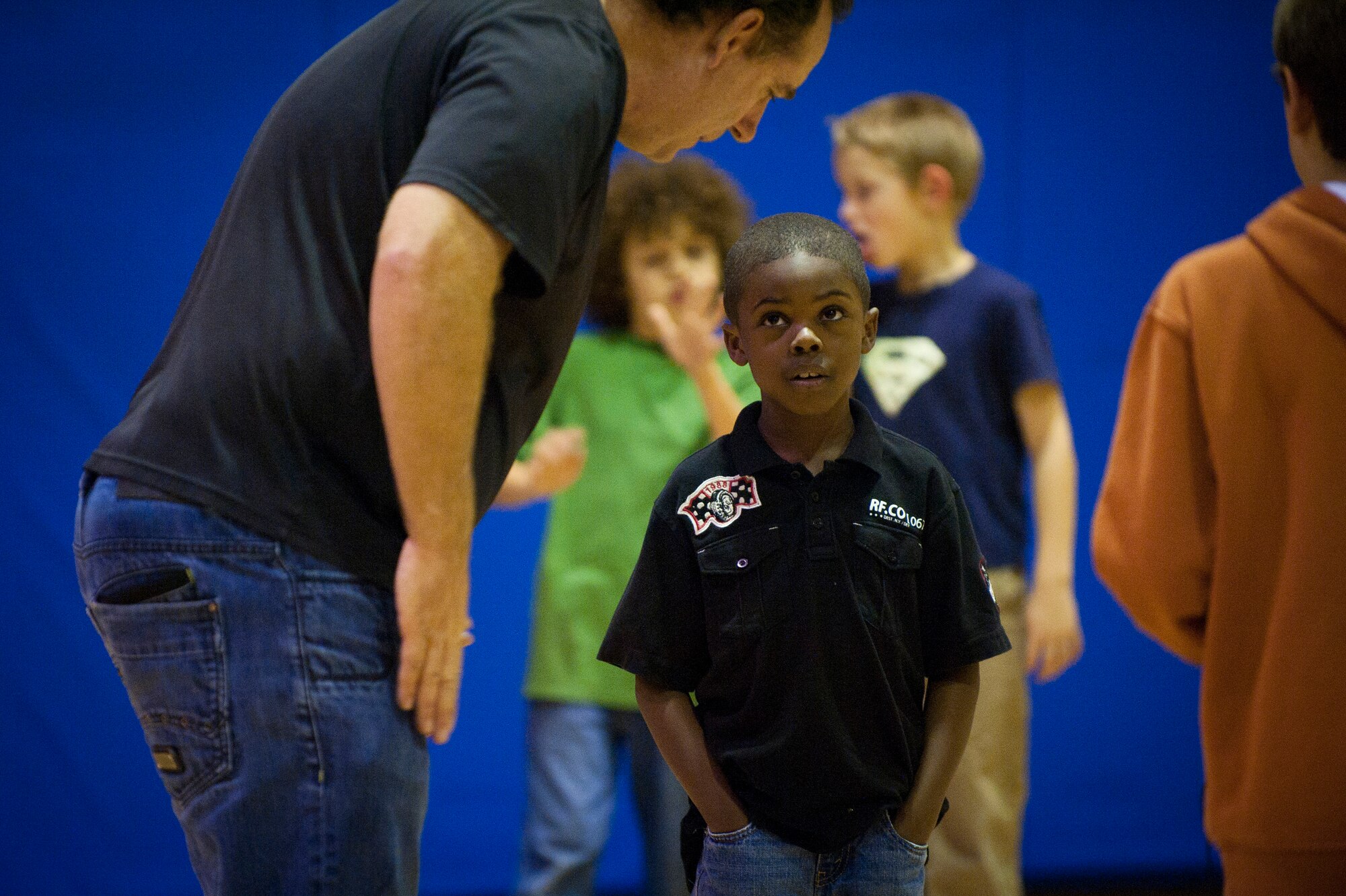 Marcus Grothues, 39th Force Support Squadron youth program specialist, gives instructions to children participating in a football mini-camp Nov. 16, 2011, at Incirlik Air Base, Turkey. The camp, hosted by the youth center, was held Nov. 14-18 in lieu of the youth football season and featured instruction on a variety of techniques for beginning players. (U.S. Air Force photo by Tech. Sgt. Michael B. Keller)