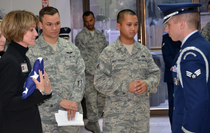 Joint Base Charleston Honor Guard performs a Presenting of the Colors ceremony for Sue Bender at the Honor Guard building in Hunley Park. Bender is the wife of Maj. Gen. William Bender. The couple visited JB Charleston Nov. 15. (US Air Force photo/A1C Tom Brading)