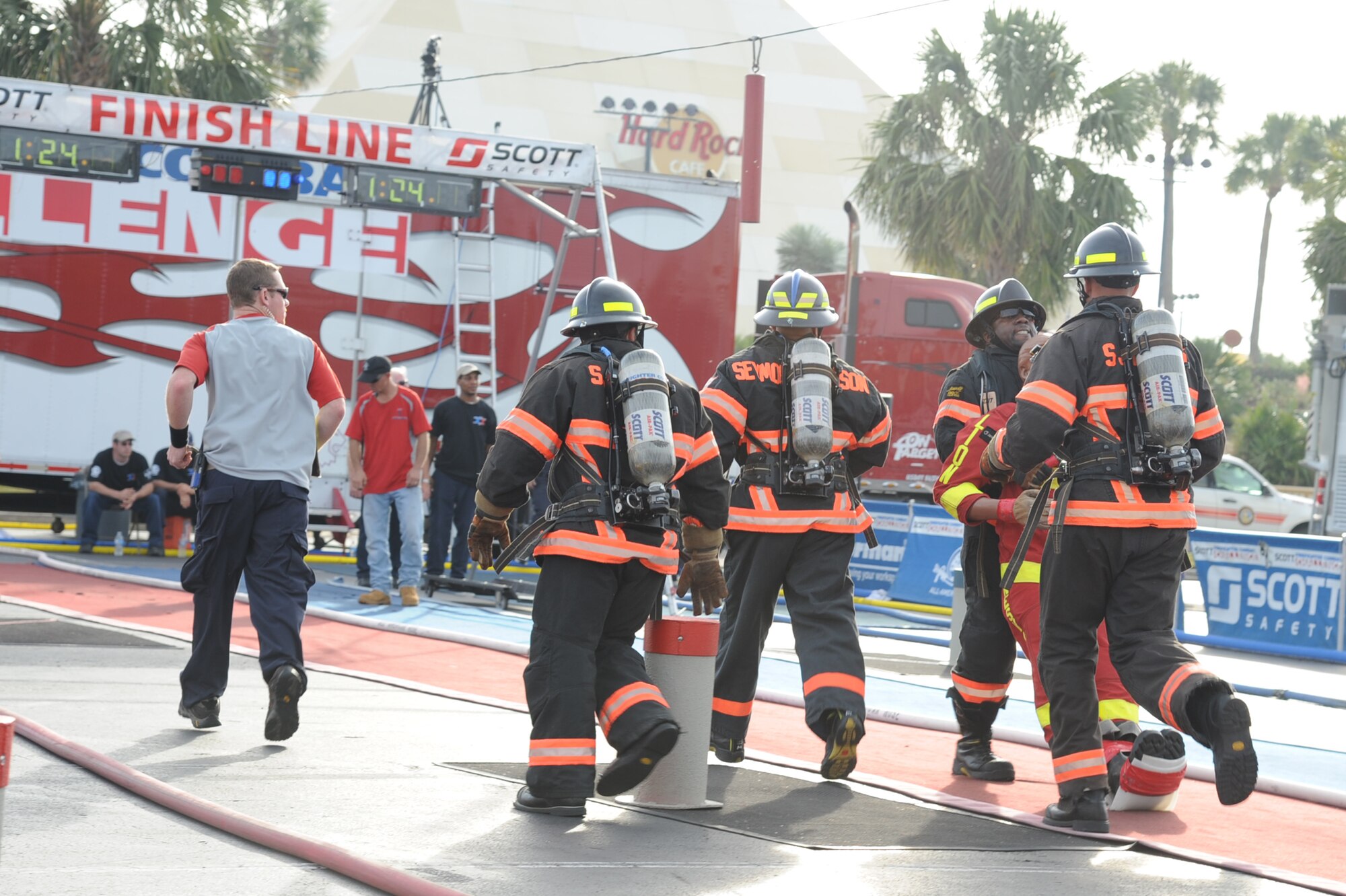 Marcus Shepard, 4th Civil Engineer Squadron lead firefighter, drags a simulated victim to the finish line during the Scott World Firefighter Combat Challenge relay in Myrtle Beach, S.C., Nov. 15, 2011. Relay teams consisted of 3-5 competitors, and are allowed 6:00 minutes to finish the course. Sheppard hails from Goldsboro, N.C. (U.S. Air Force photo by Senior Airman Whitney Stanfield)