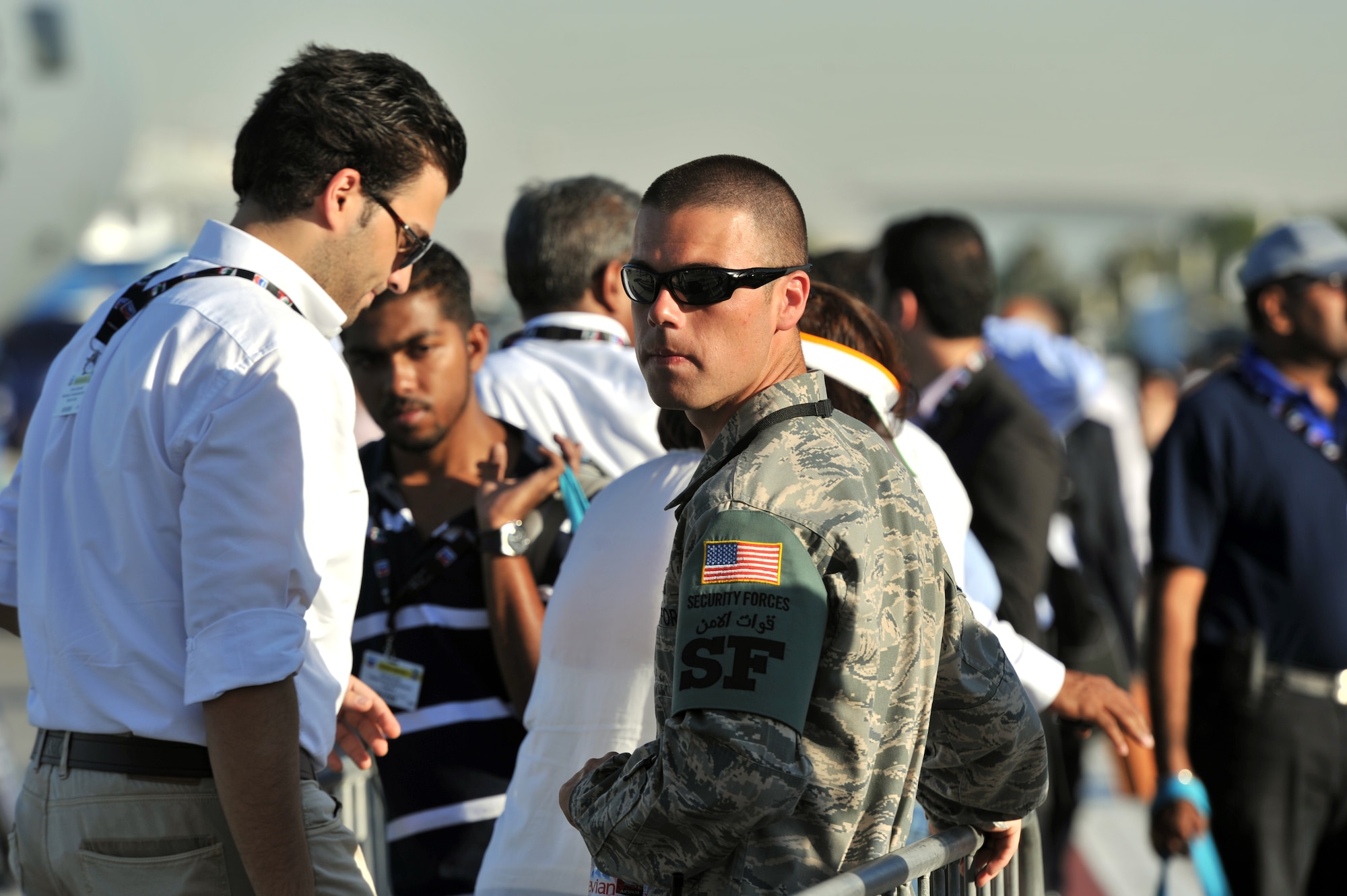 Staff Sgt. Matthew Carlson, 6th Security Forces Squadron, MacDill Air Force Base, Fla. provides security for U.S. aircraft on display during the Dubai Airshow Nov. 15, 2011. The event welcomed more than 100 aircraft, some of them appearing for the first time in the Middle East. The daily flying demonstration will display a full complement of both civil and military aircraft, including the Eurofighter Typhoon, Boeing's F-18 Super Hornet, F-15E Strike Eagle  and Dassault's Rafale fighter. (U.S. Air Force photo by Tech. Sgt. Rey Ramon)