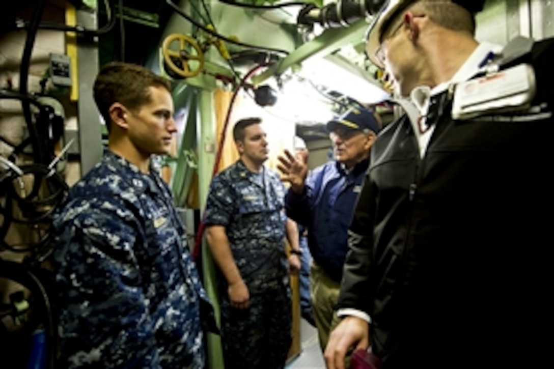 Defense Secretary Leon E. Panetta visits the crew and workers from General Dynamics Electric Boat aboard the Virginia-class attack submarine to be commissioned the USS Mississippi in Groton, Conn., Nov. 17, 2011. Panetta observed the final phase in the building of the submarine, which will be finished a year ahead of schedule and 15 million dollars under budget.