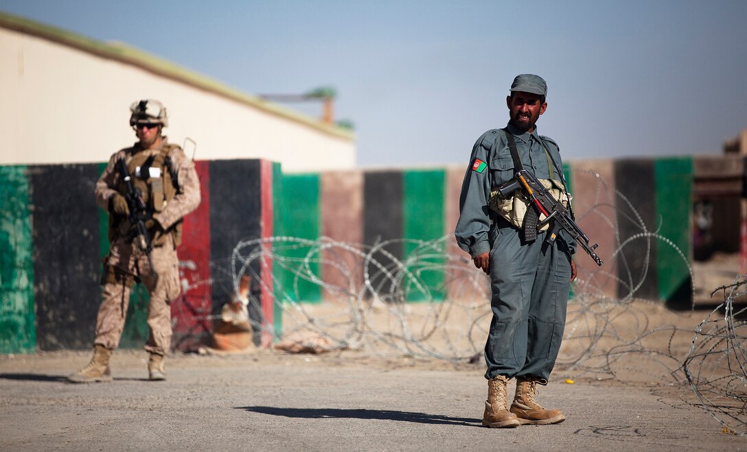 A truck carrying thousands of pounds of mail delivers it to the Postal Detachment, 2nd Marine Logistics Group (Forward), aboard Camp Leatherneck, Afghanistan, Nov. 18.  More than 10,000 pounds of mail is delivered to the postal facility on a daily basis, which will double as the holidays approach.  (U.S. Marine Corps photo by Cpl. Katherine M. Solano)