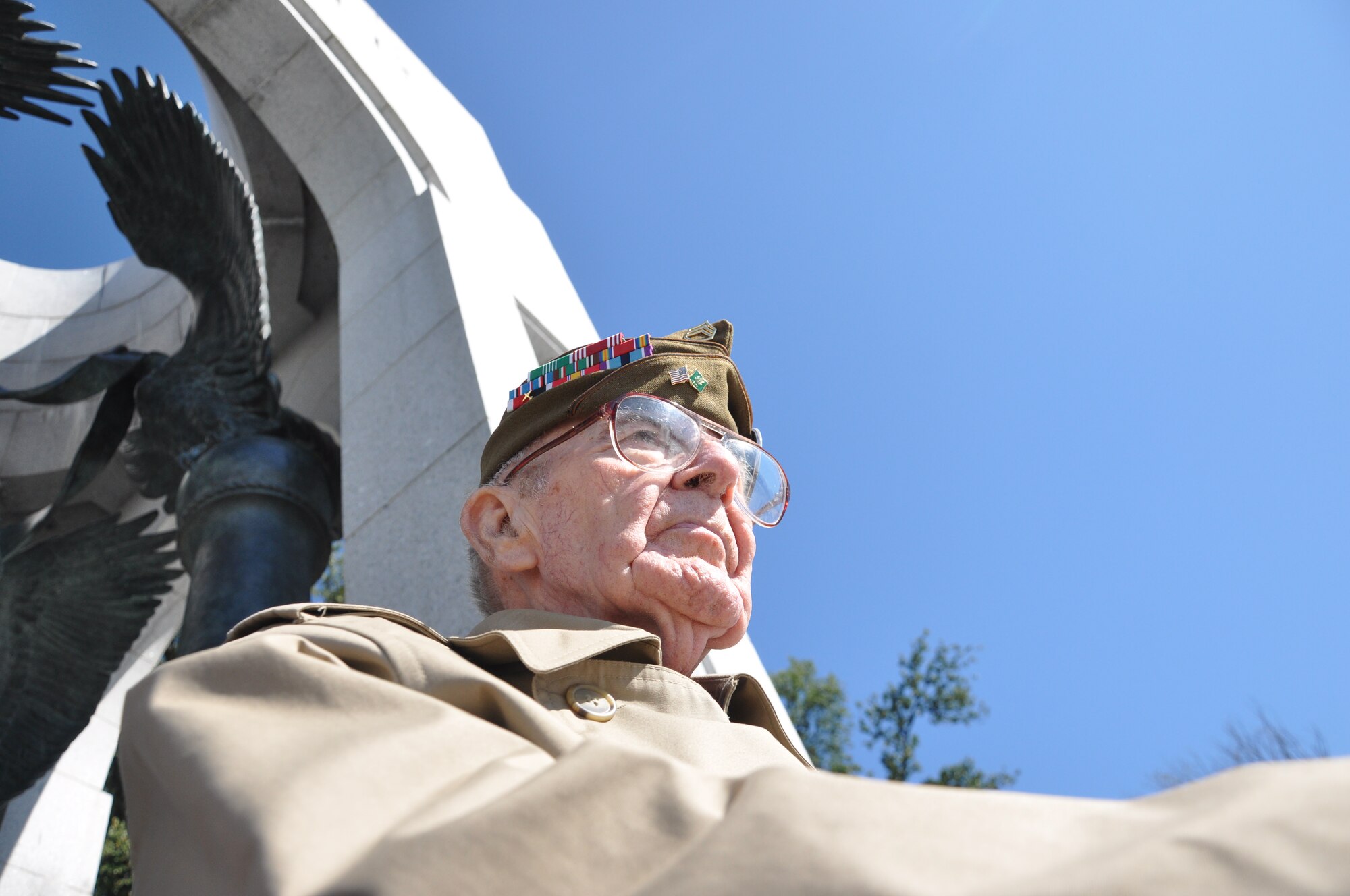 “This should have been done sooner,” said Ed Barnett, who served in the Navy and Army Air Corps in World War II and later in the Air Force, as he looked out over the World War II Memorial during an Honor Flight to Washington, D.C. Honor Flights take veterans of WW II to the memorial built to honor their sacrifice. (U.S. Air Force photo/2nd Lt. Cait Suttie)