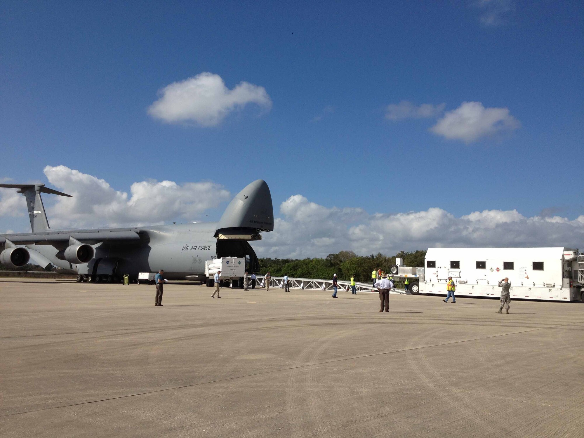 The U.S. Air Force's fourth Wideband Global satellite communication spacecraft arrived at the Shuttle Landing Facility at Kennedy Space Center, Fla., Nov. 15. Photo by Capt. Joseph Maguadog, Military Satellite Communications Systems Directorate, Space and Missile Systems Center.