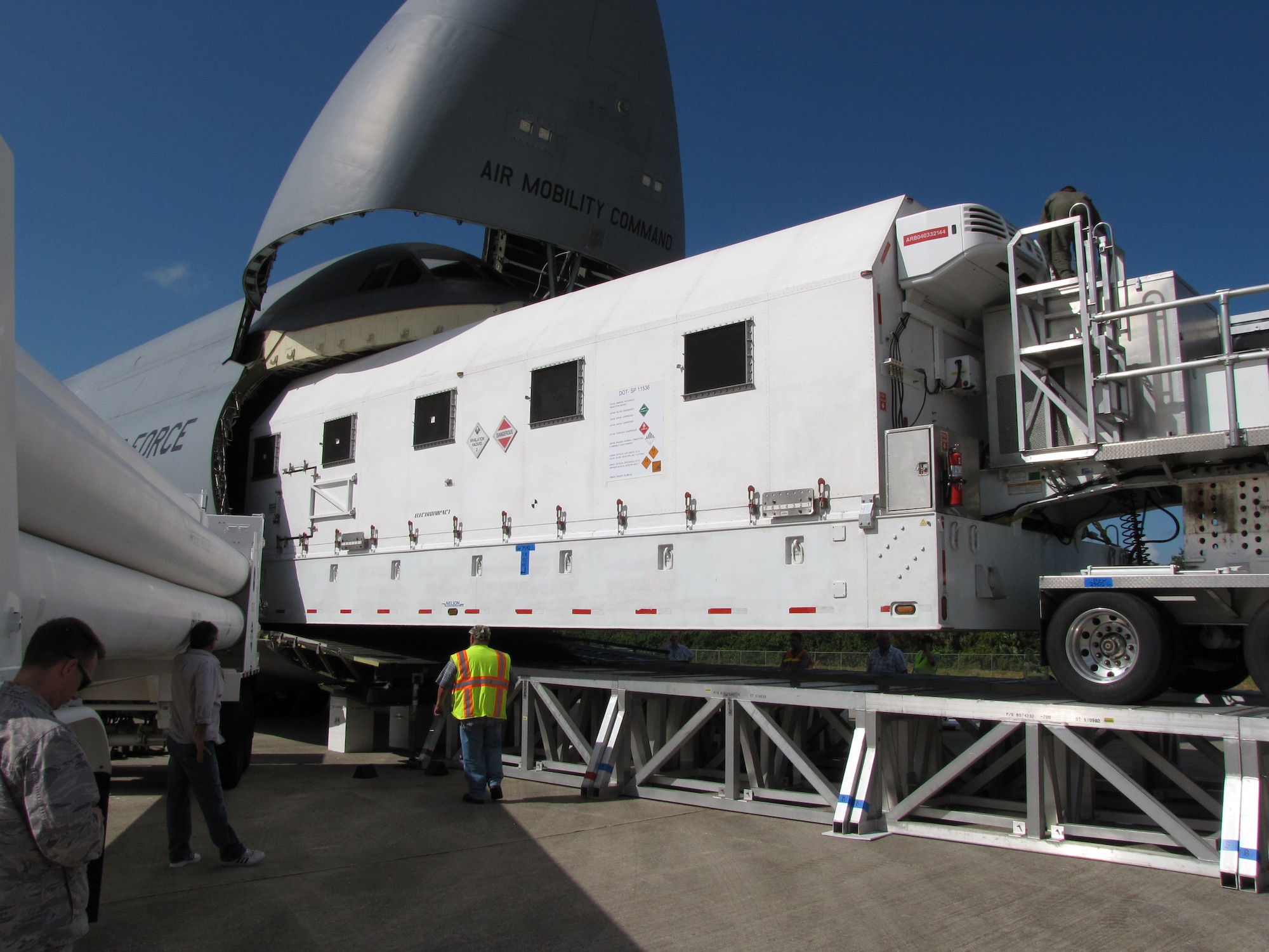 The U.S. Air Force’s fourth Wideband Global satellite communication spacecraft offloads from a C-5 Galaxy at the Shuttle Landing Facility, Kennedy Space Center, Fla., Nov. 15. Wideband Global SATCOM provides anytime, anywhere communication for the warfighter through broadcast, multicast, and point-to-point connections. WGS-4 will undergo final processing, encapsulation and transport to Launch Complex 37 at Cape Canaveral Air Force Station, Fla., where it is scheduled to launch atop a Delta IV evolved expendable launch vehicle Jan. 19, 2012. U.S. (Air Force photo/Maj. Rob Russell)