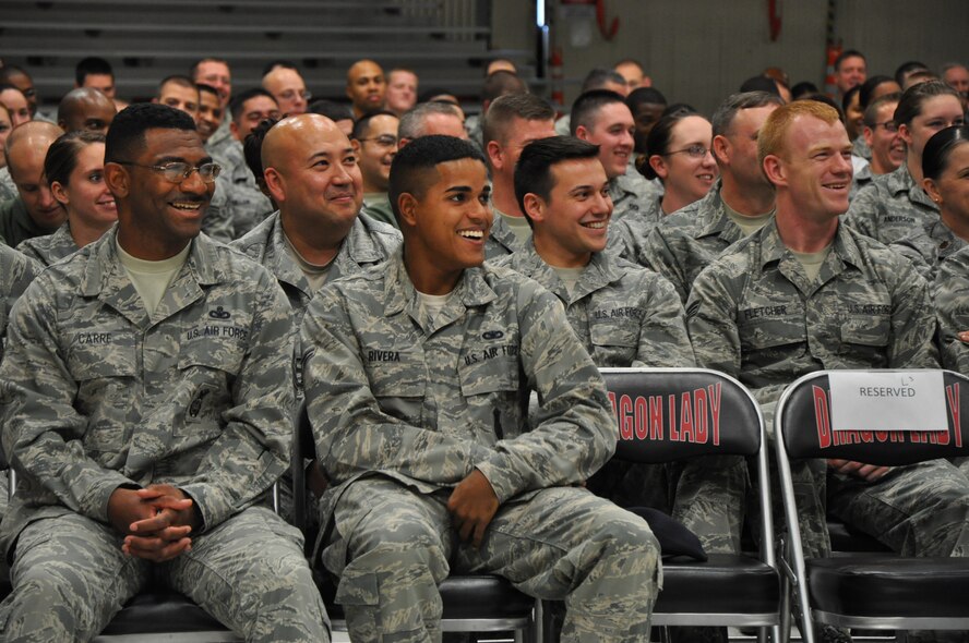 Airmen react during the Happy Hour comedy tour featuring comedian Bernie McGrenahan at Beale Air Force Base, Calif., Nov. 16, 2011. McGrenahan’s show uses comedy and his personal experiences to send a message to Airmen of don’t drink and drive.